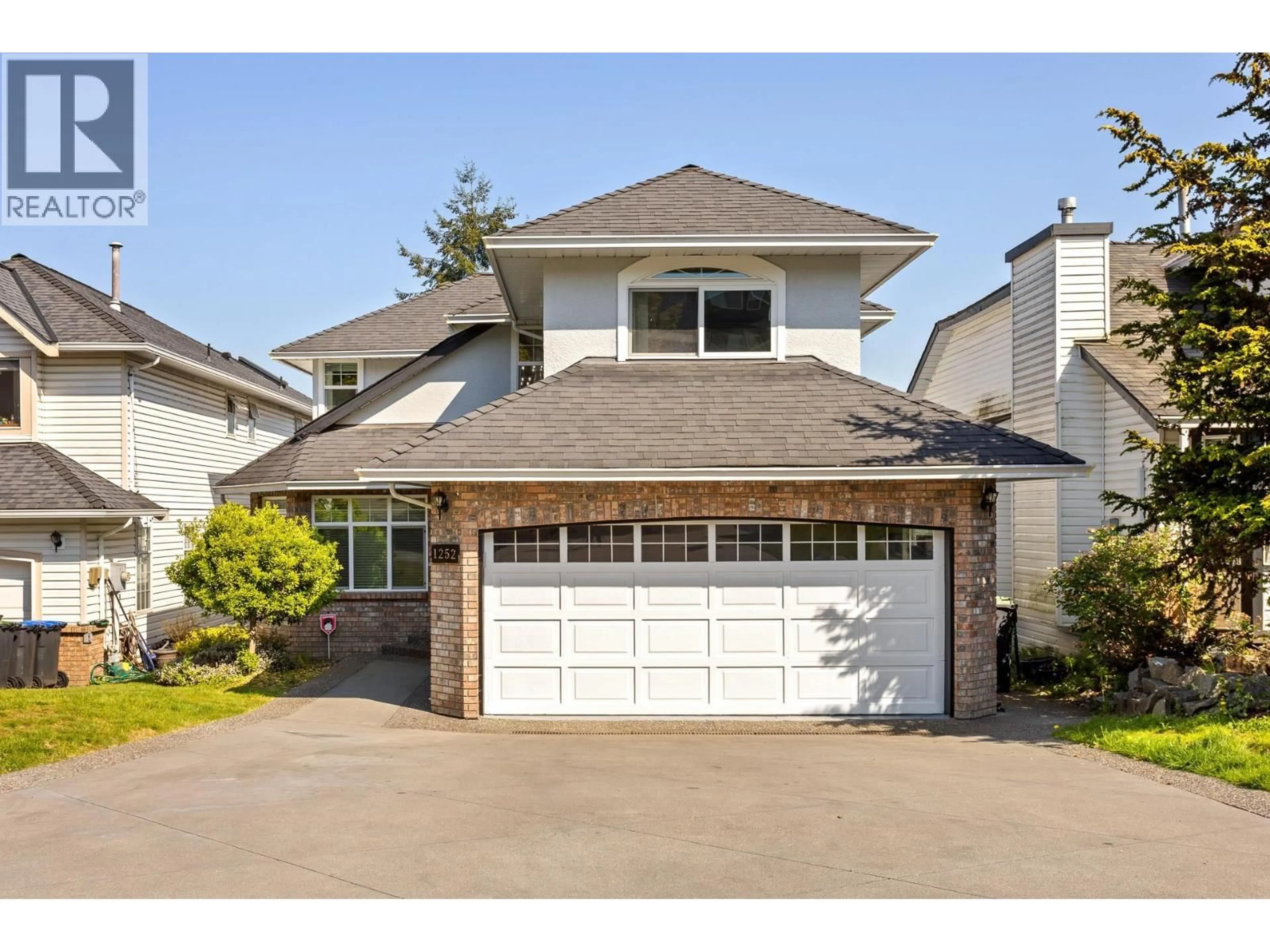 Home with vinyl exterior material, street for 1252 GATEWAY PLACE, Port Coquitlam British Columbia V3C5X4