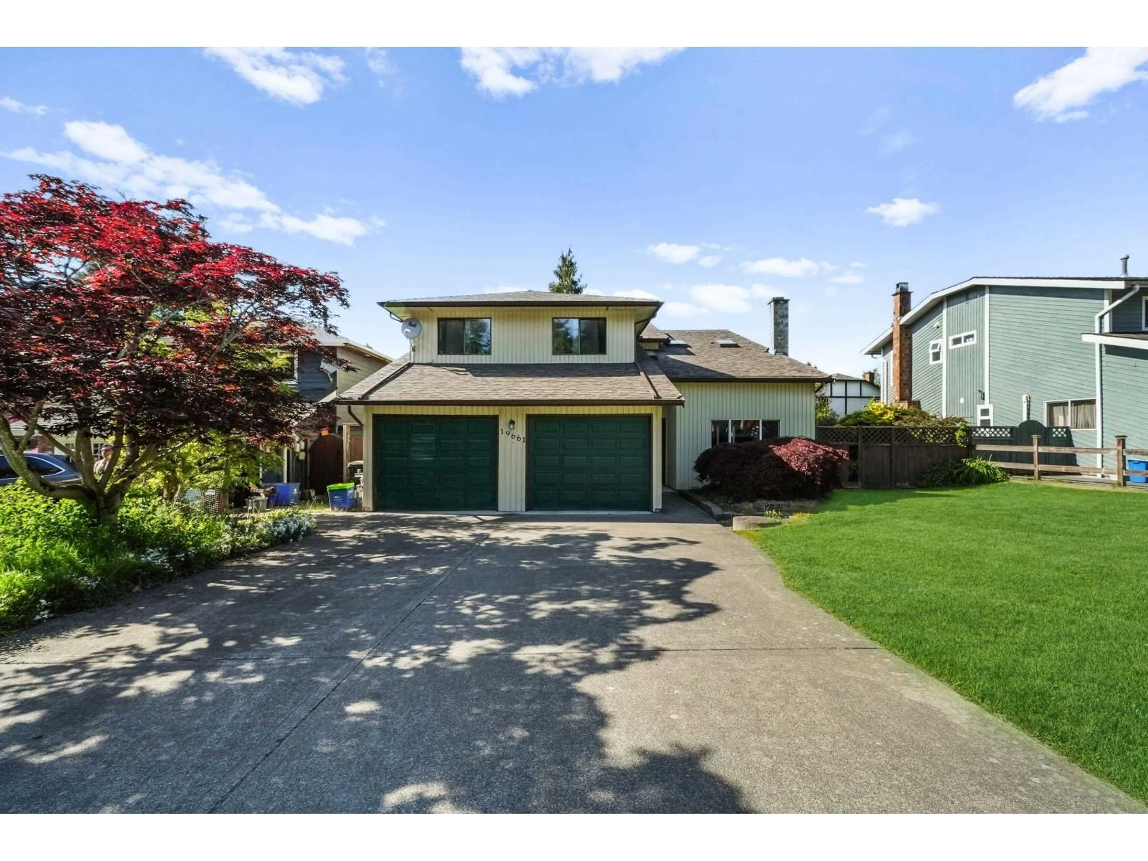 Home with vinyl exterior material, street for 19661 50A AVENUE, Langley British Columbia V3A7K9