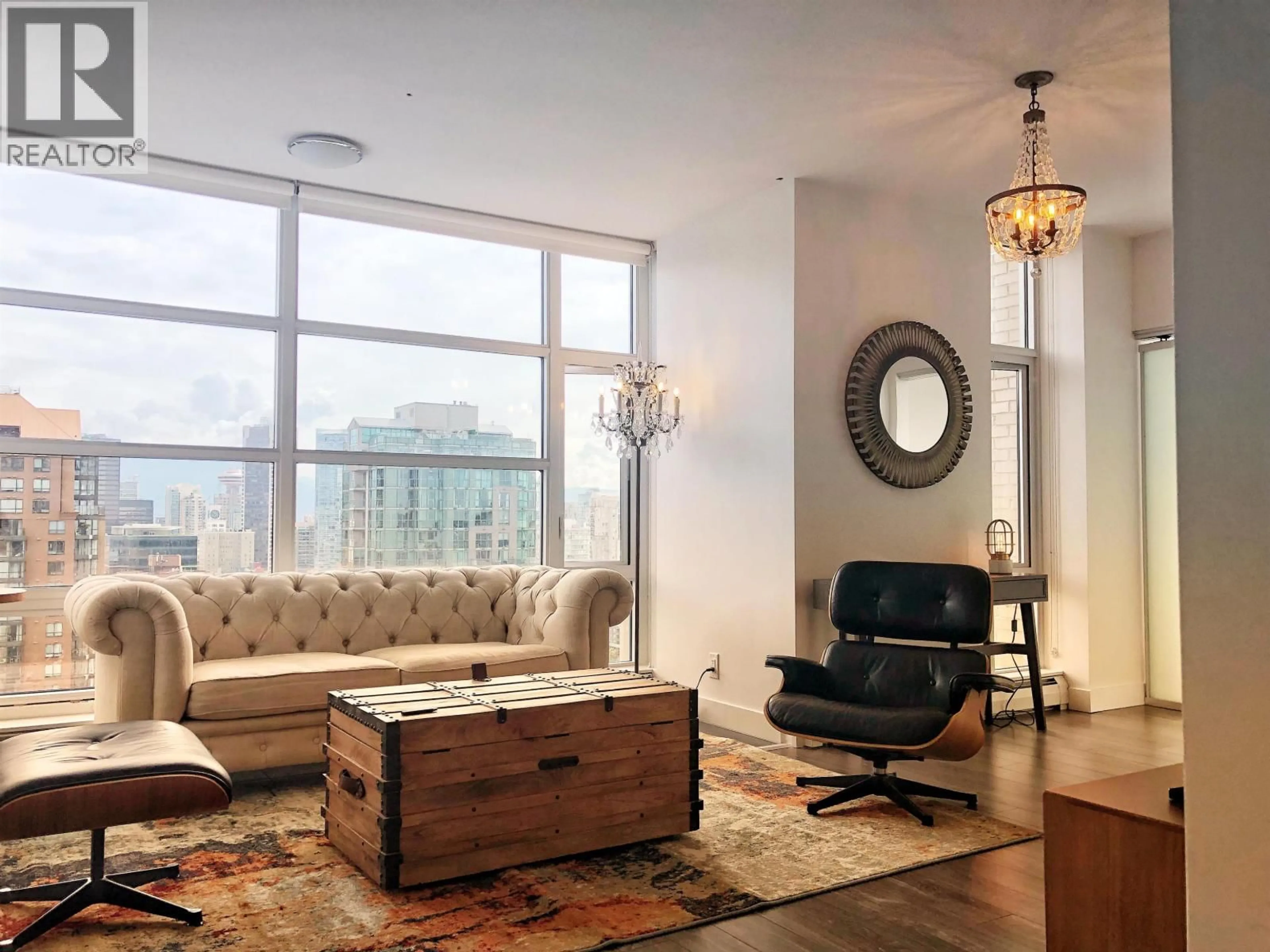 Living room with furniture, wood/laminate floor for 2703 - 1283 HOWE STREET, Vancouver British Columbia V6Z0E3