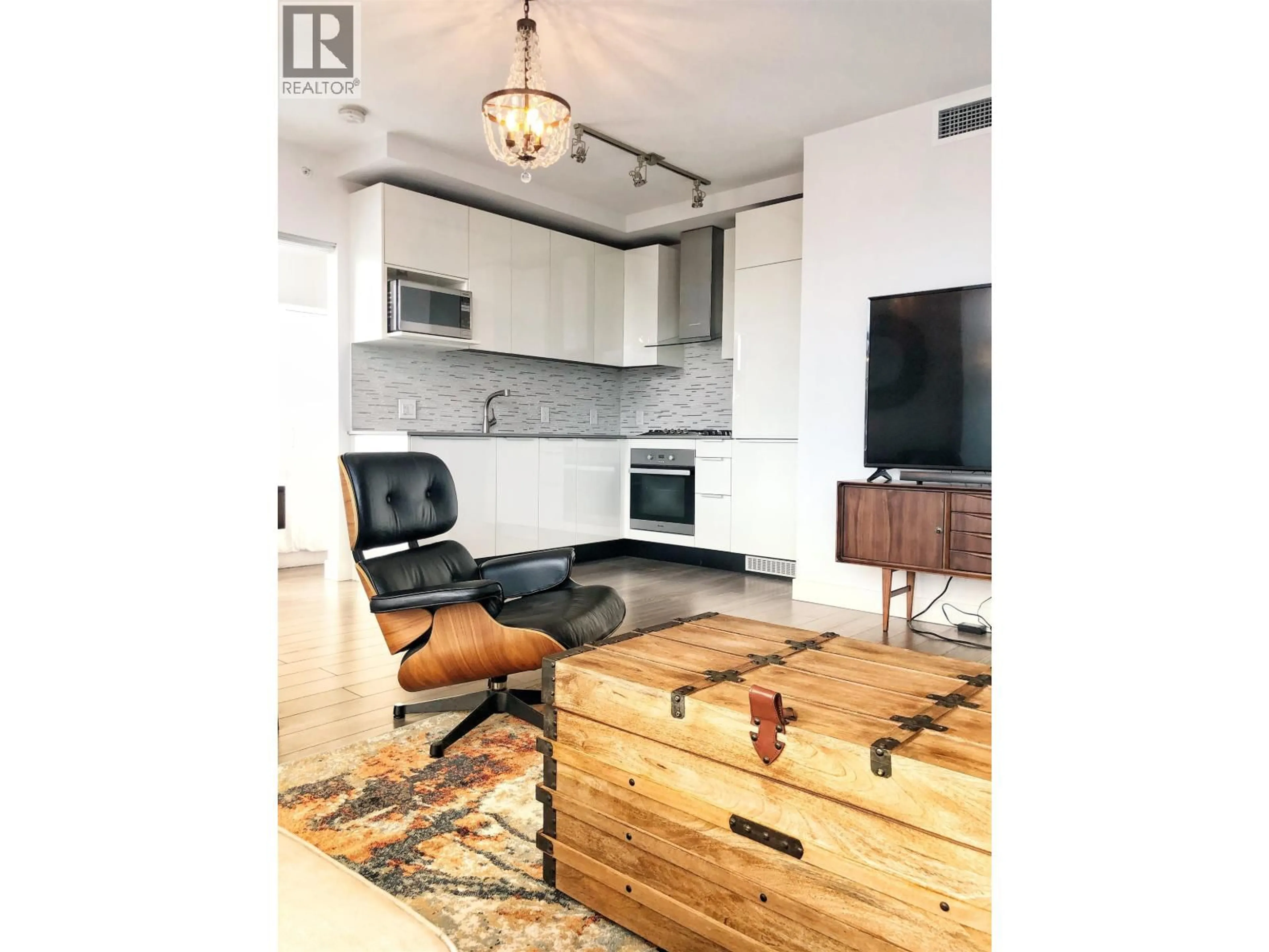 Open concept kitchen, wood/laminate floor for 2703 - 1283 HOWE STREET, Vancouver British Columbia V6Z0E3