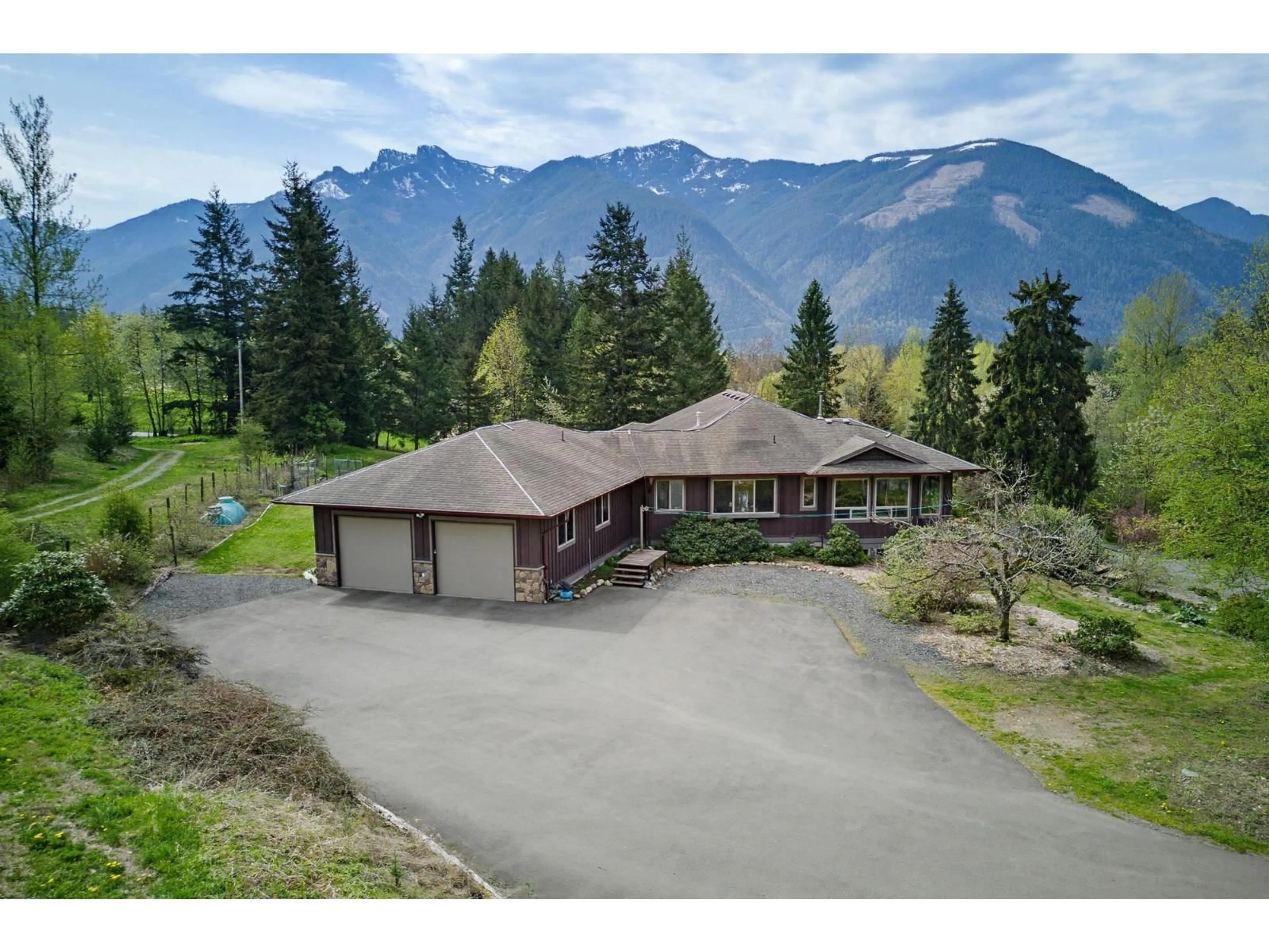 A pic from outside/outdoor area/front of a property/back of a property/a pic from drone, mountain view for 49635 ELK VIEW ROAD, Chilliwack British Columbia V4Z1G5