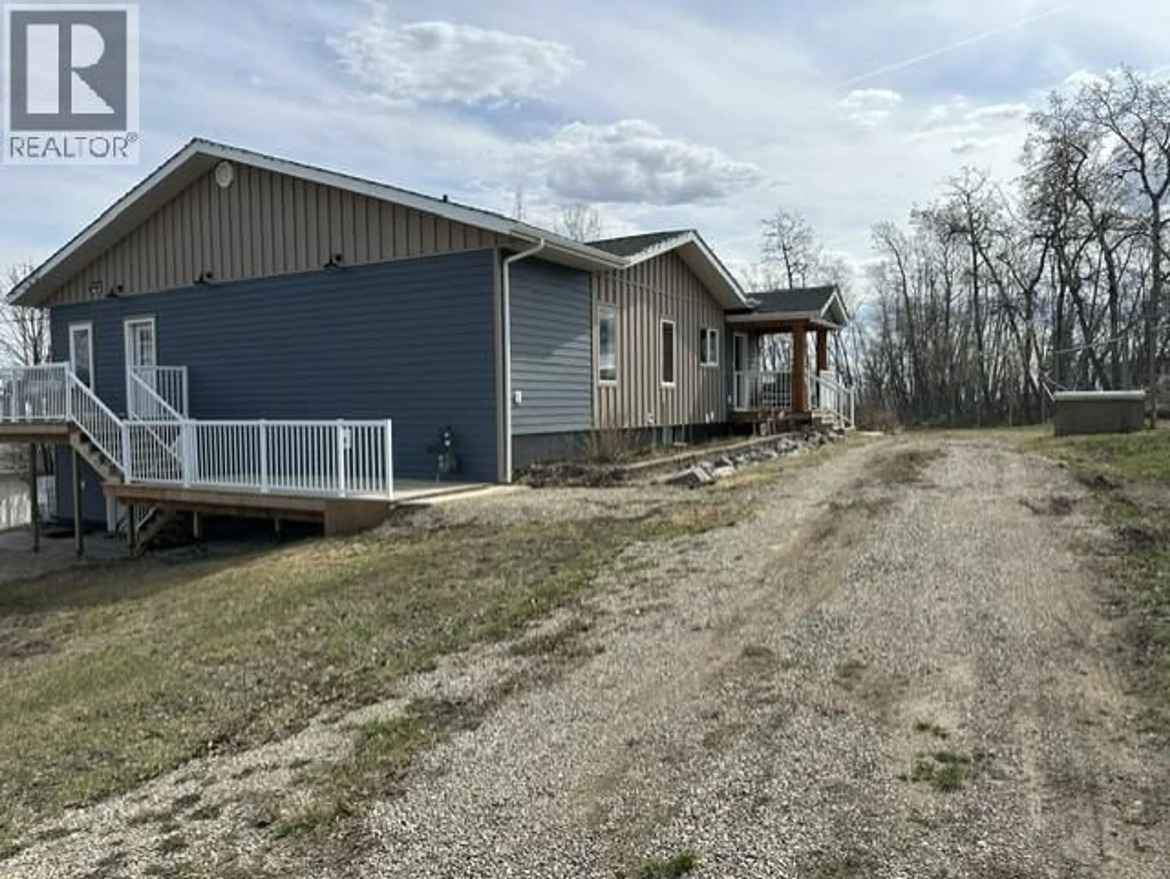 A pic from outside/outdoor area/front of a property/back of a property/a pic from drone, building for 12363 244 ROAD, Fort St. John British Columbia V1J8K1