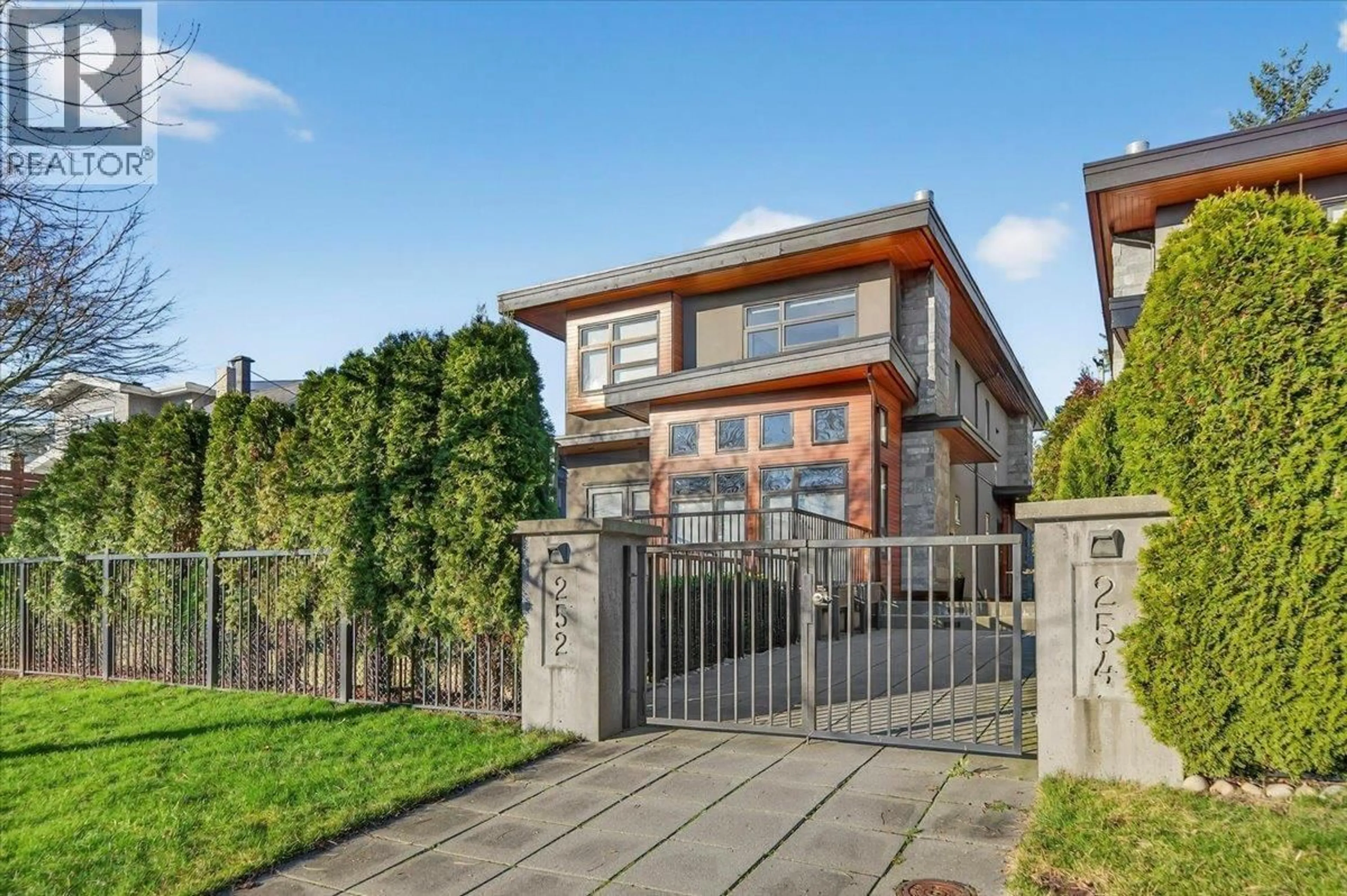 Home with brick exterior material, street for 2 - 252 19TH STREET, North Vancouver British Columbia V7L2Z2
