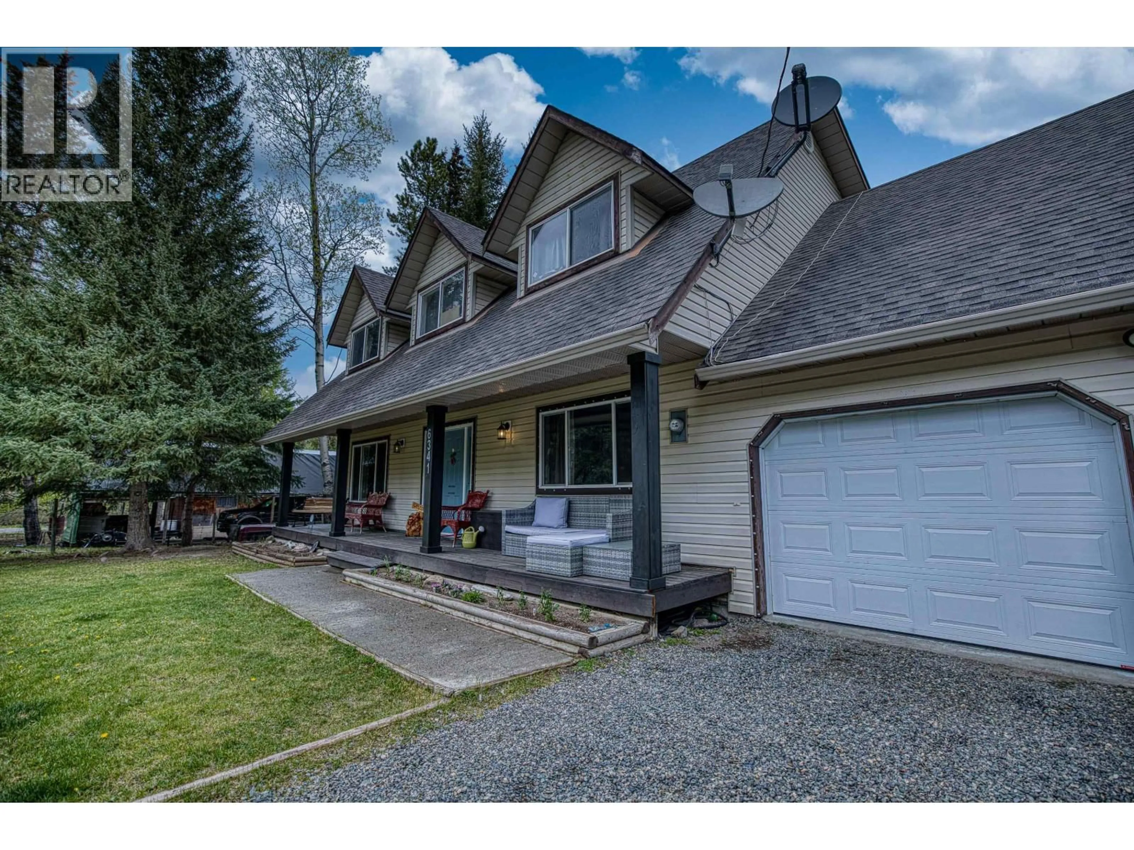 Home with vinyl exterior material, street for 6341 WOLFE ROAD, 100 Mile House British Columbia V0K2E3