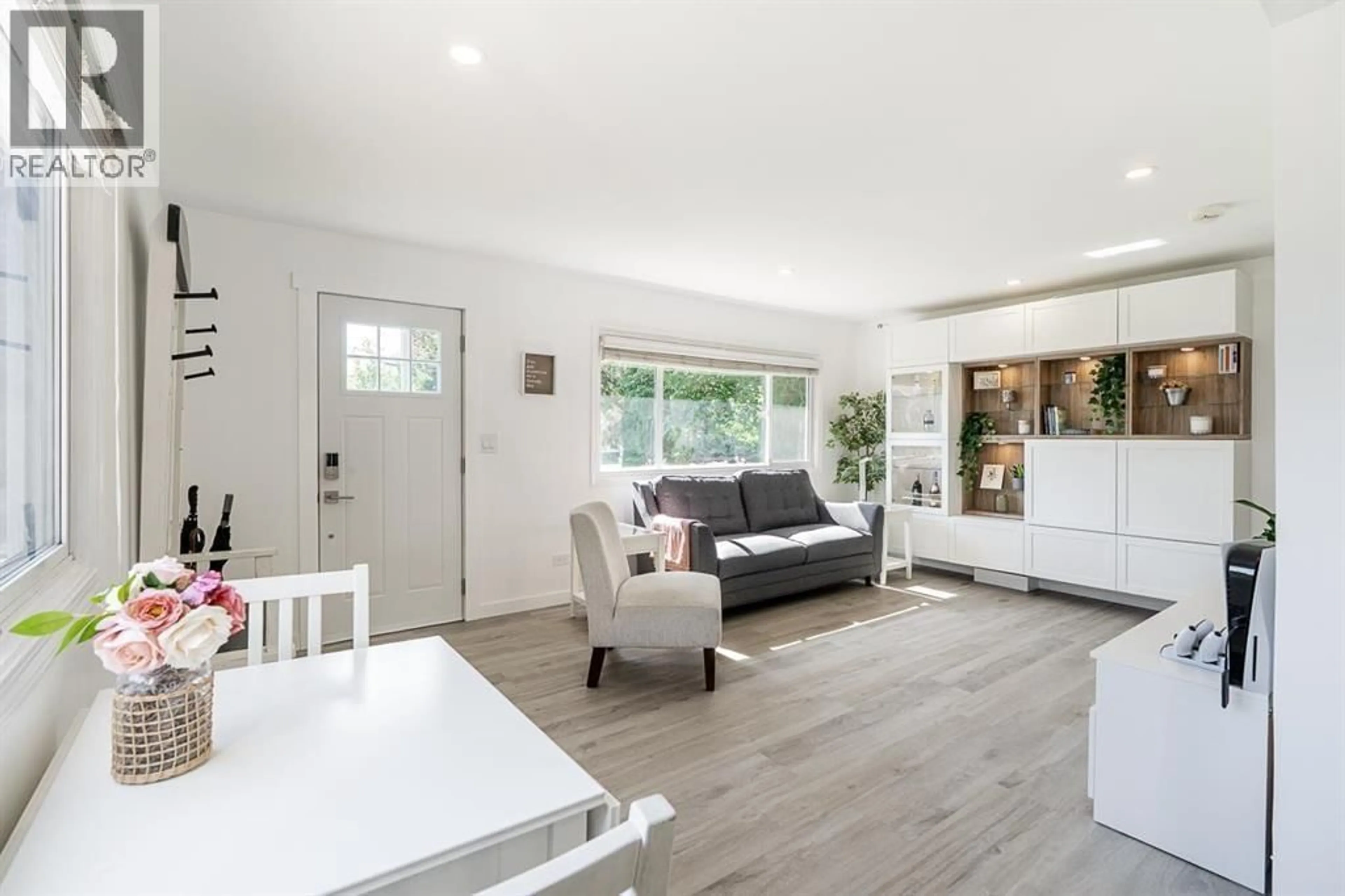 Living room with furniture, wood/laminate floor for 23035 117 AVENUE, Maple Ridge British Columbia V2X2K3