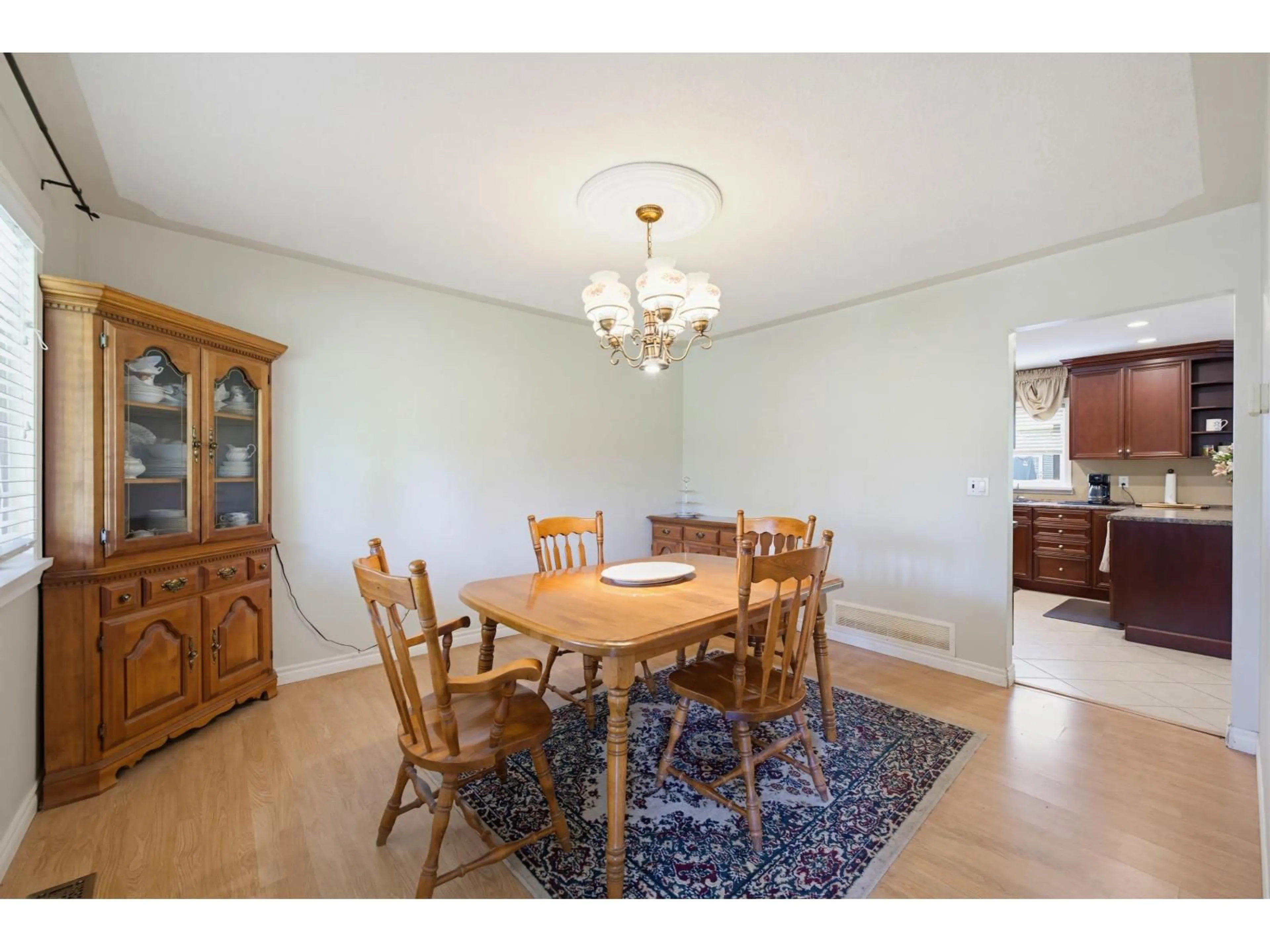 Dining room, wood/laminate floor for 22724 76B CRESCENT, Langley British Columbia V1M2J8