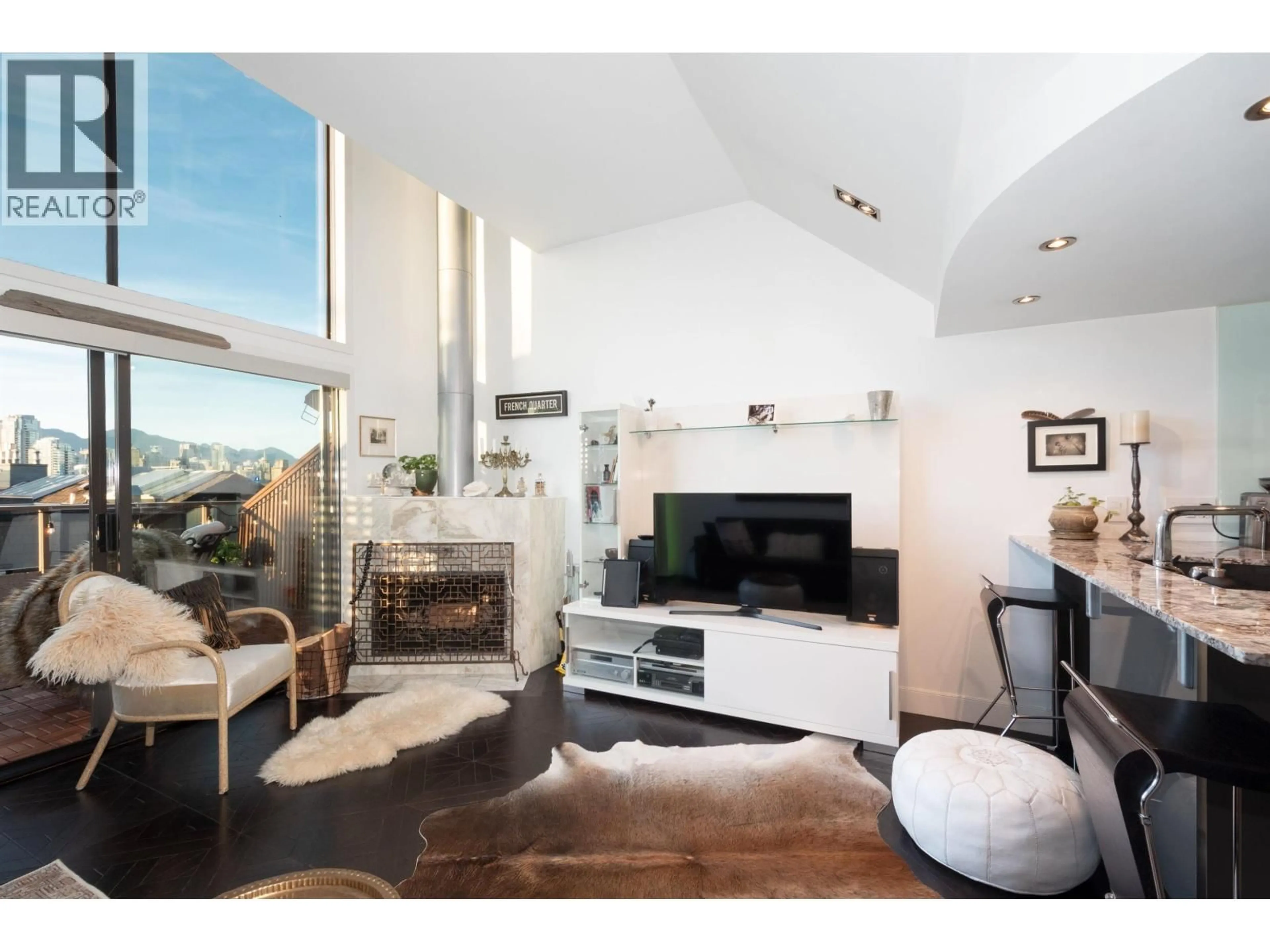 Living room with furniture, wood/laminate floor for 1167 8TH AVENUE, Vancouver British Columbia V6H1C5