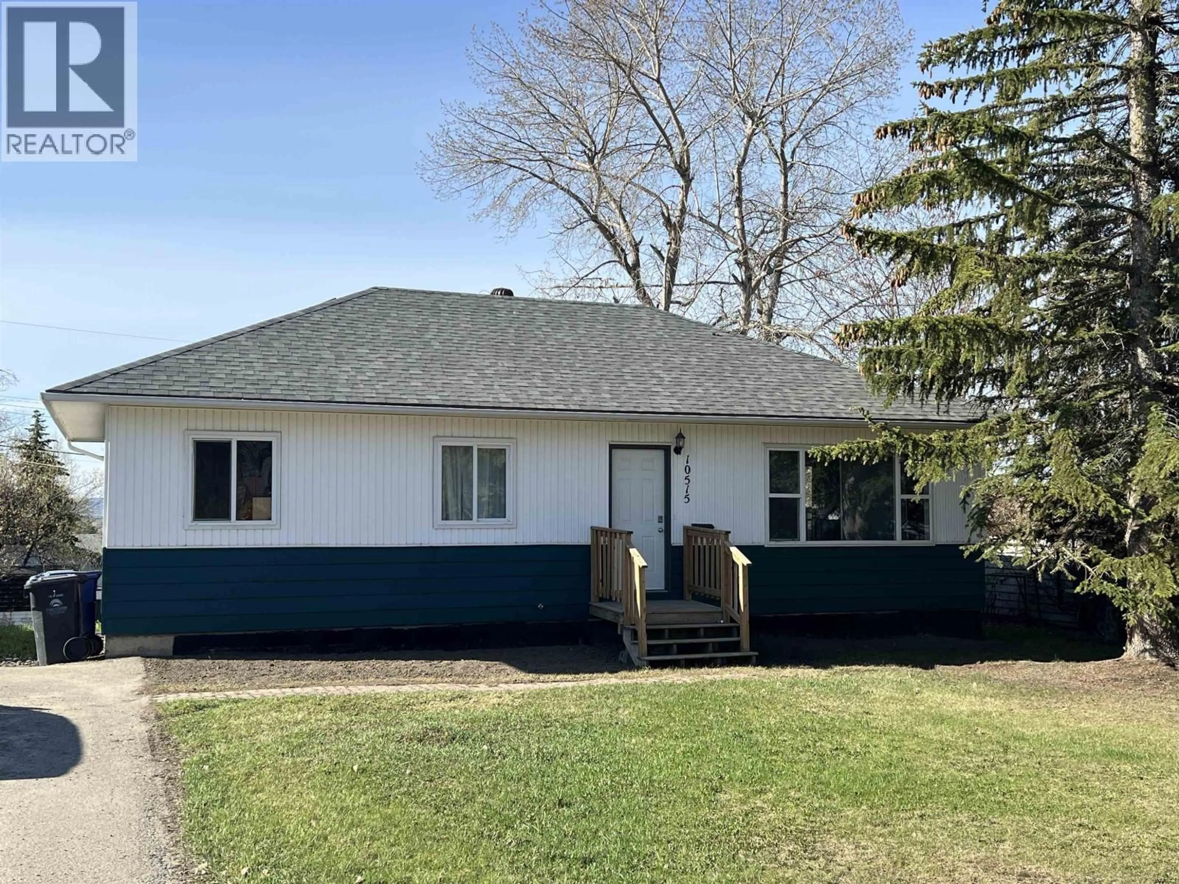 Home with vinyl exterior material, street for 10515 104 AVENUE, Fort St. John British Columbia V1J2K9