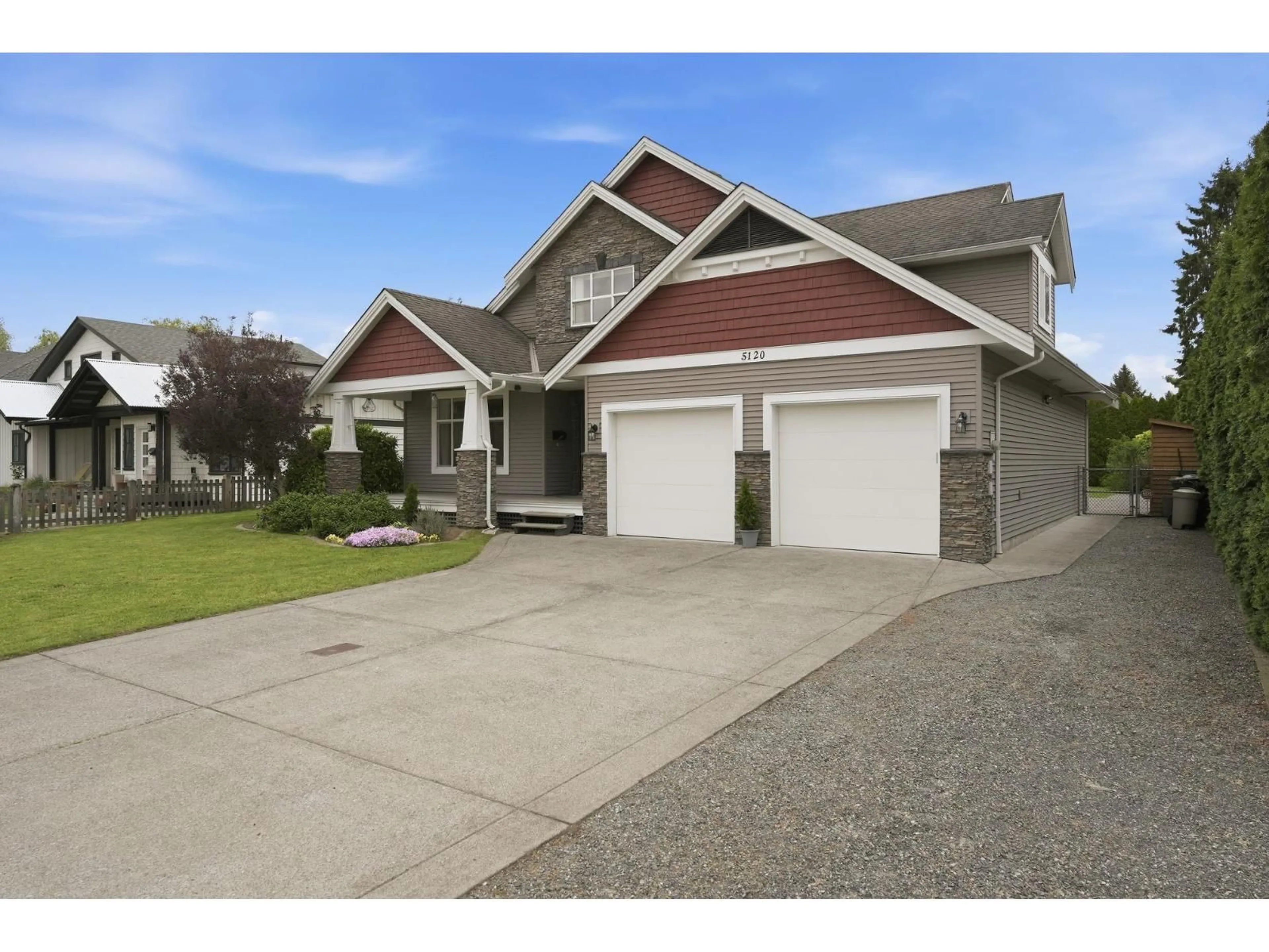 Home with vinyl exterior material, street for 5120 214 STREET, Langley British Columbia V3A5B7