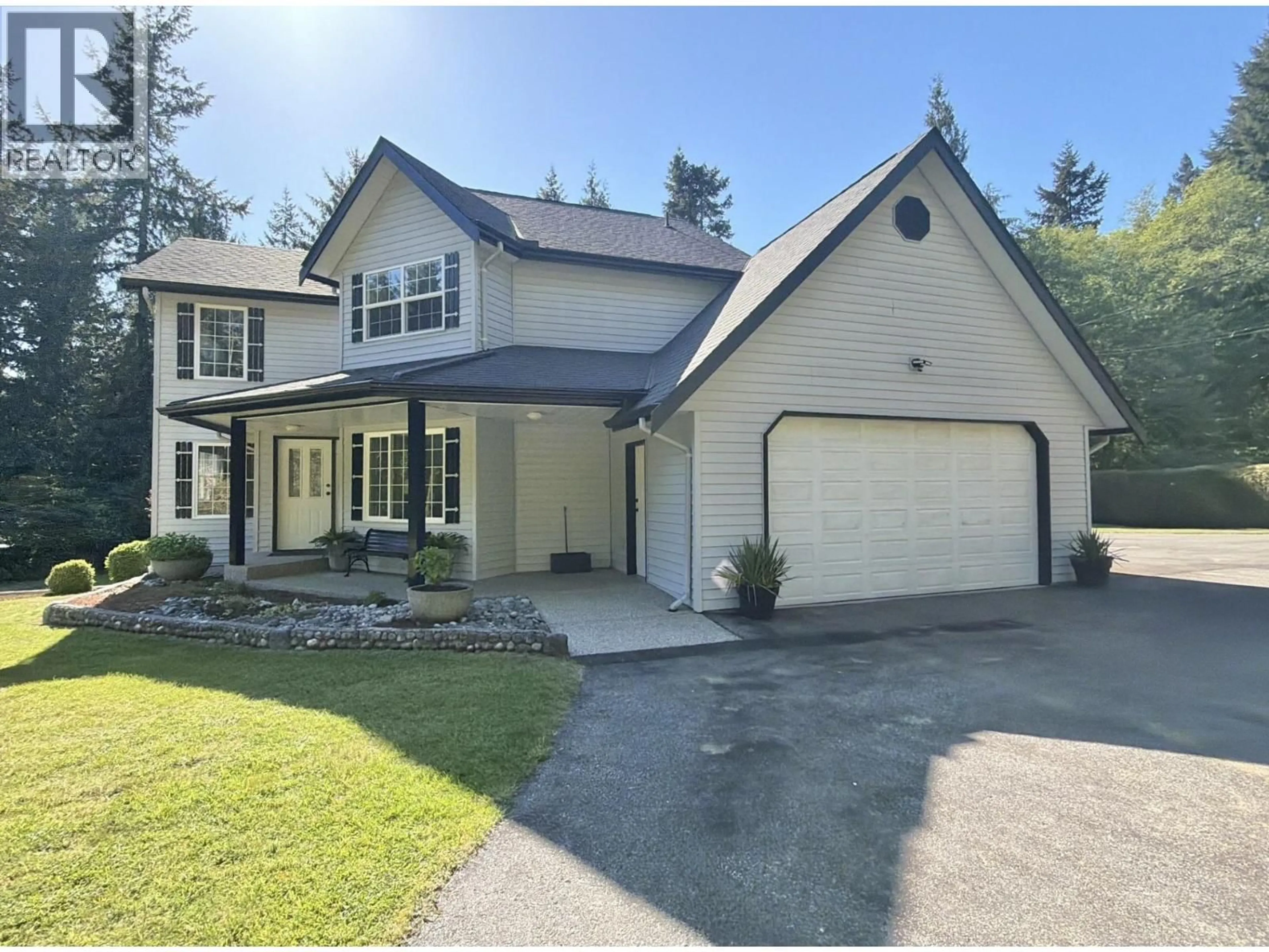 Home with vinyl exterior material, street for 1499 HANBURY ROAD, Roberts Creek British Columbia V0N2W1