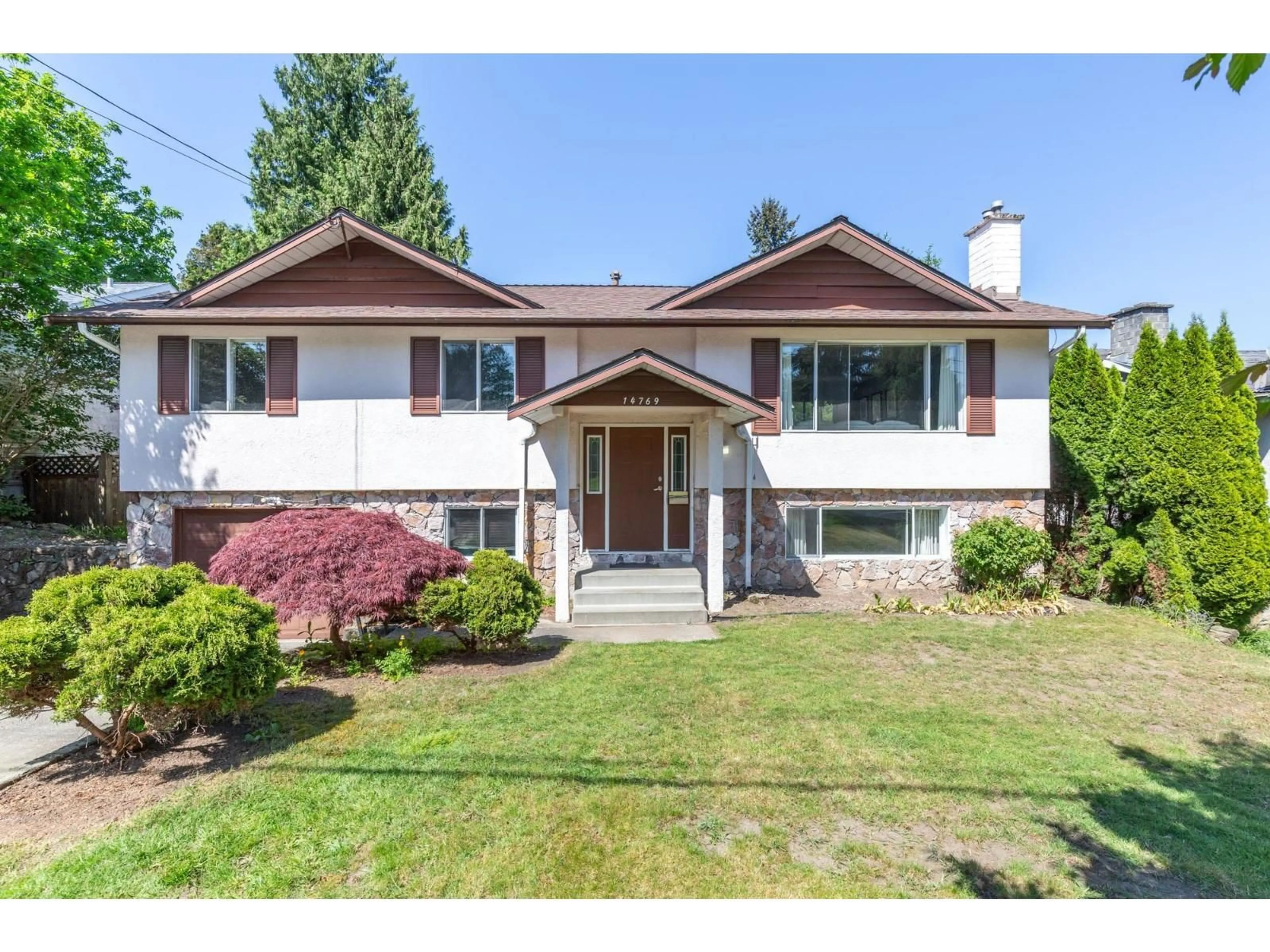 Home with vinyl exterior material, street for 14769 110 AVENUE, Surrey British Columbia V3R2A9