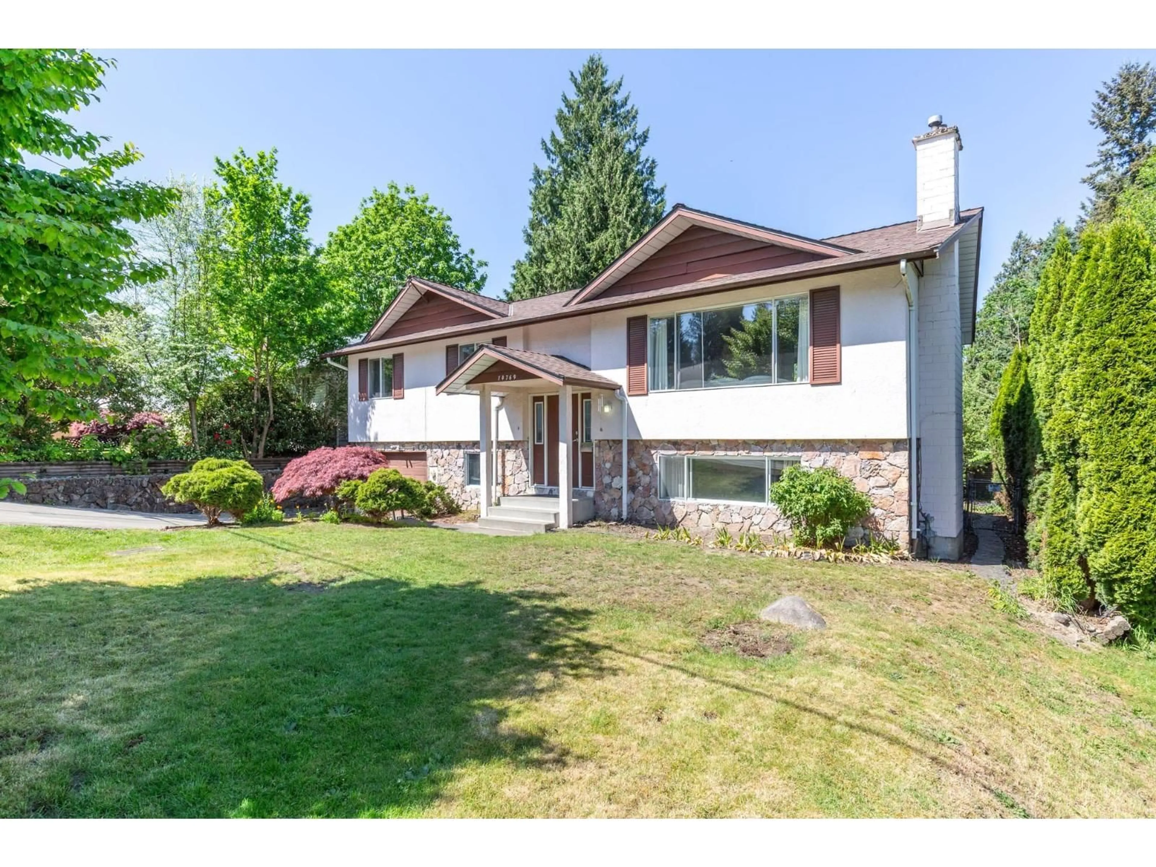 Home with vinyl exterior material, street for 14769 110 AVENUE, Surrey British Columbia V3R2A9
