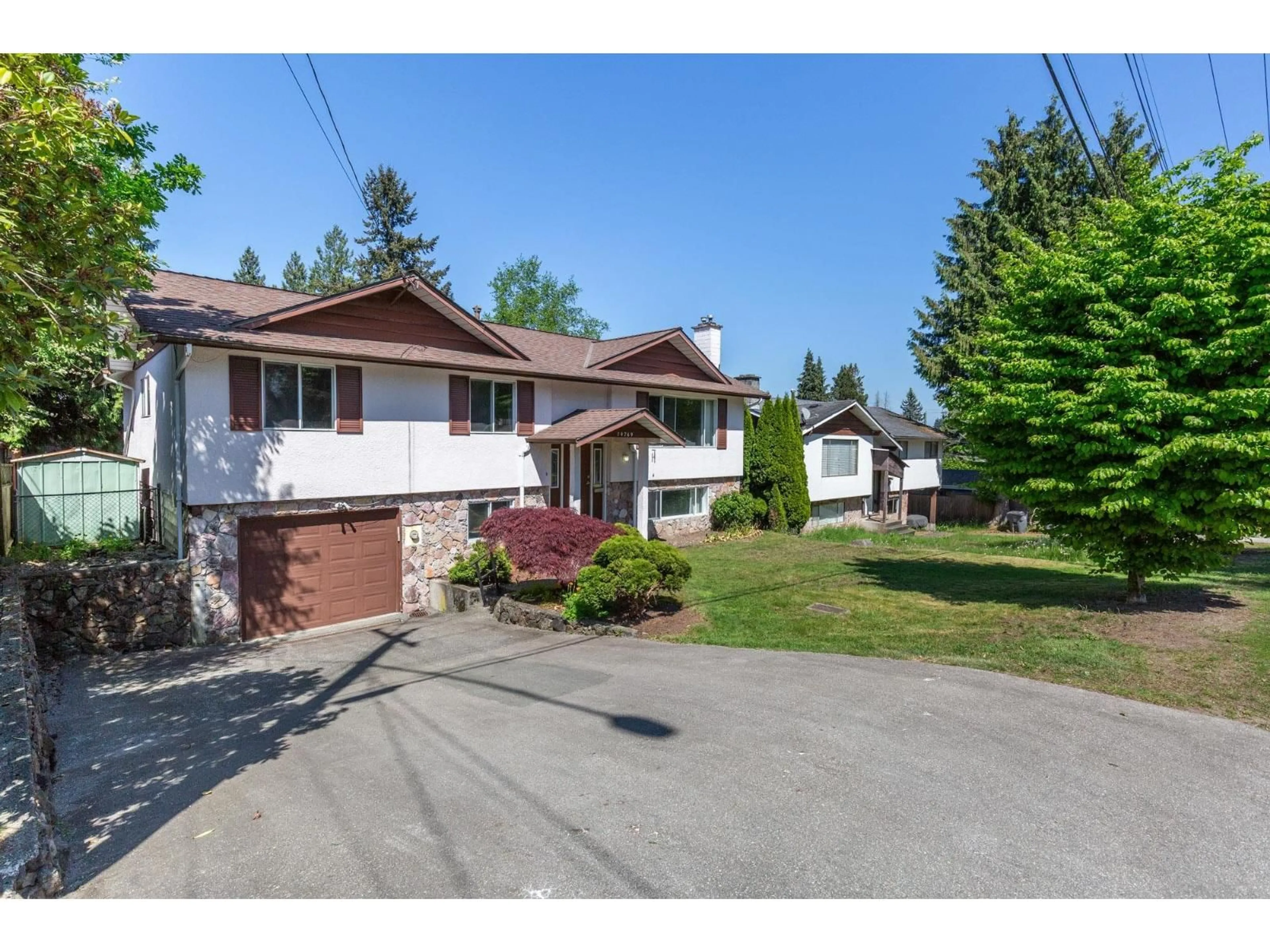 A pic from outside/outdoor area/front of a property/back of a property/a pic from drone, street for 14769 110 AVENUE, Surrey British Columbia V3R2A9