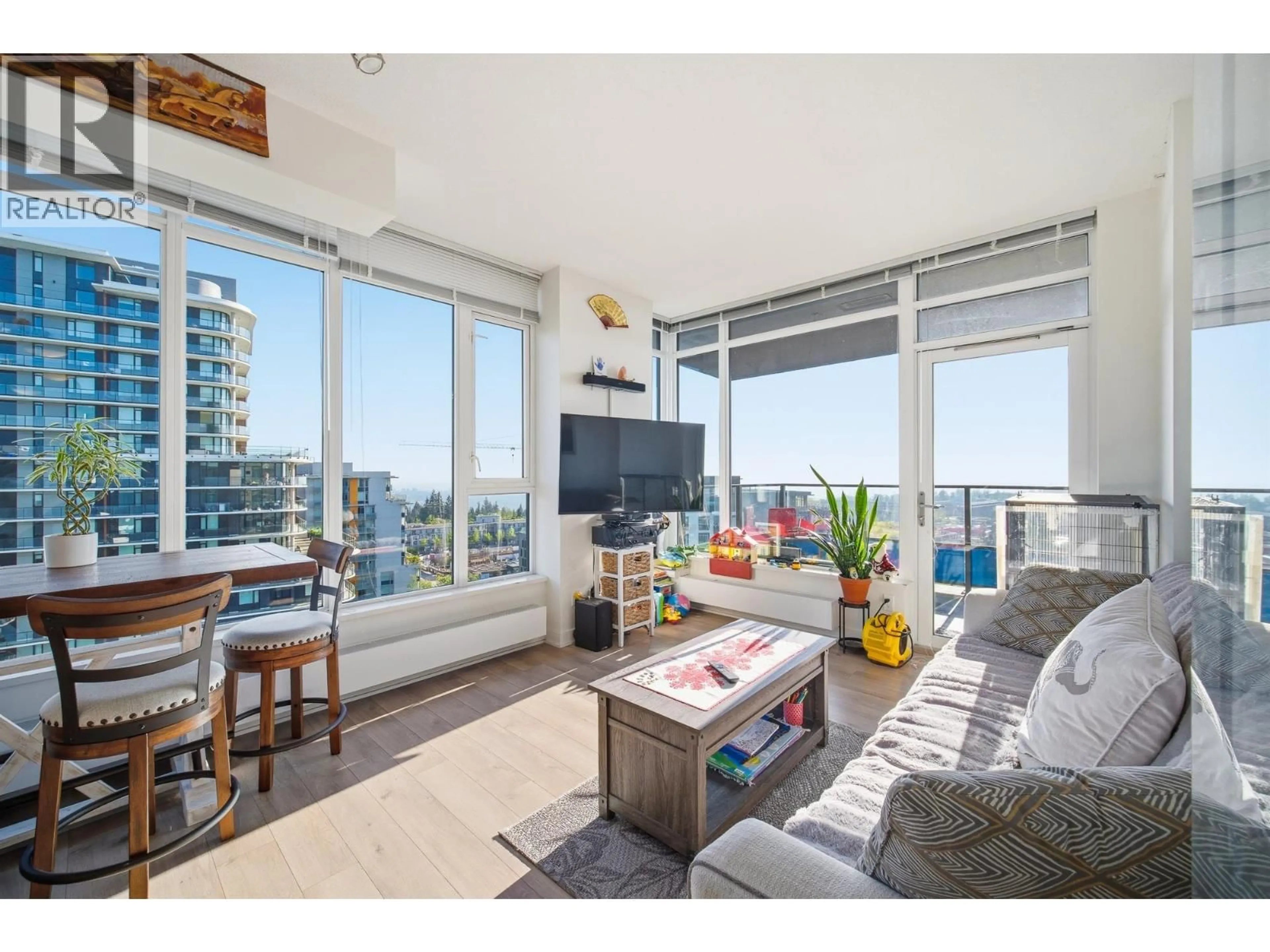 Living room with furniture, wood/laminate floor for 1308 - 8850 UNIVERSITY CRESCENT, Burnaby British Columbia V5A0C8