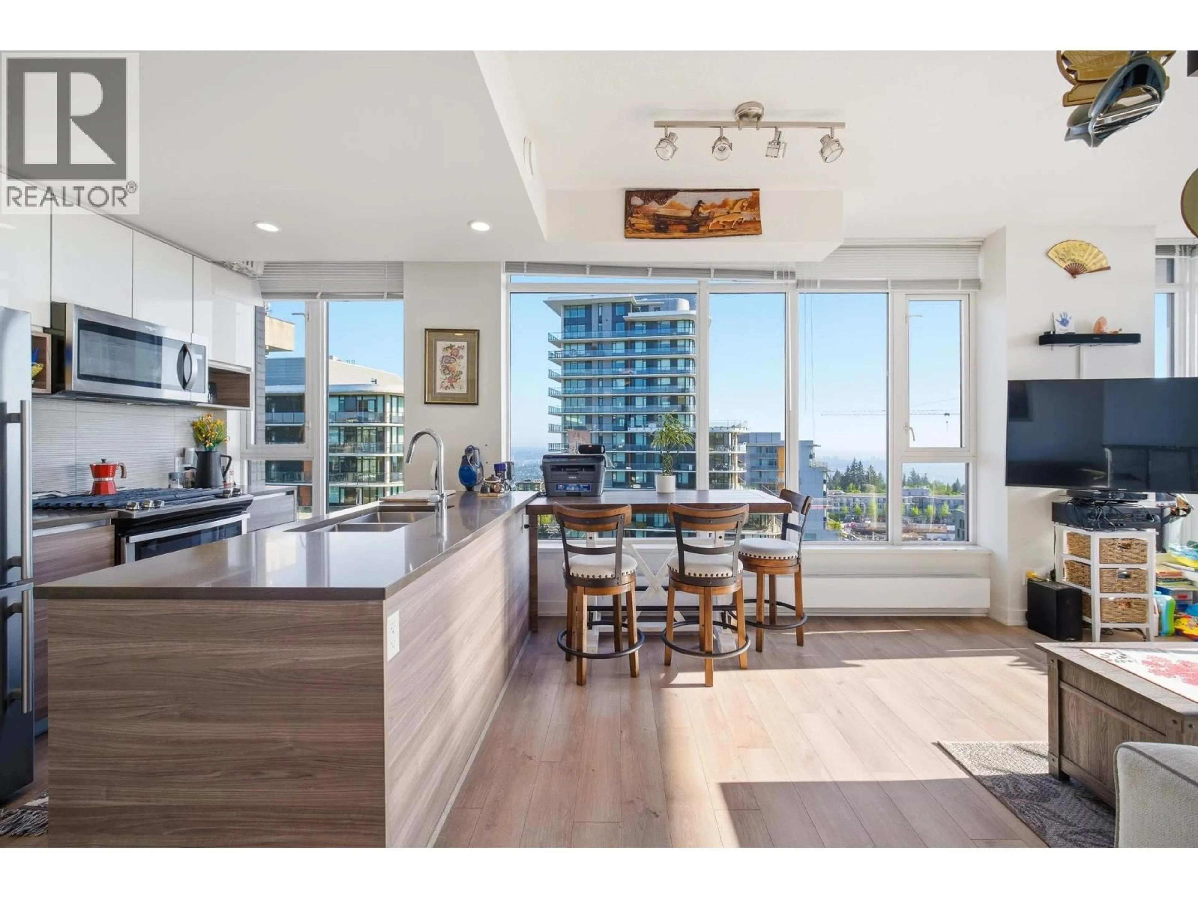 Open concept kitchen, wood/laminate floor for 1308 - 8850 UNIVERSITY CRESCENT, Burnaby British Columbia V5A0C8