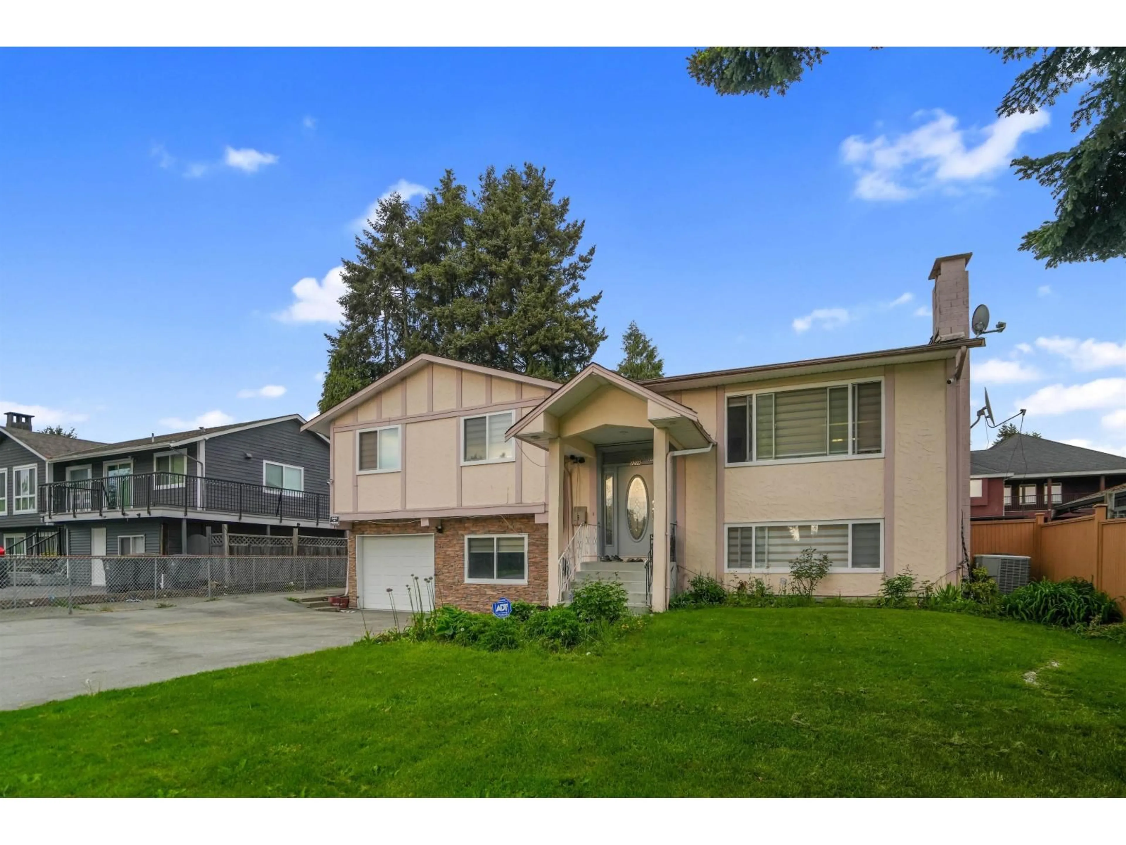 Home with vinyl exterior material, street for 9298 CINNAMON DRIVE, Surrey British Columbia V3V1V2