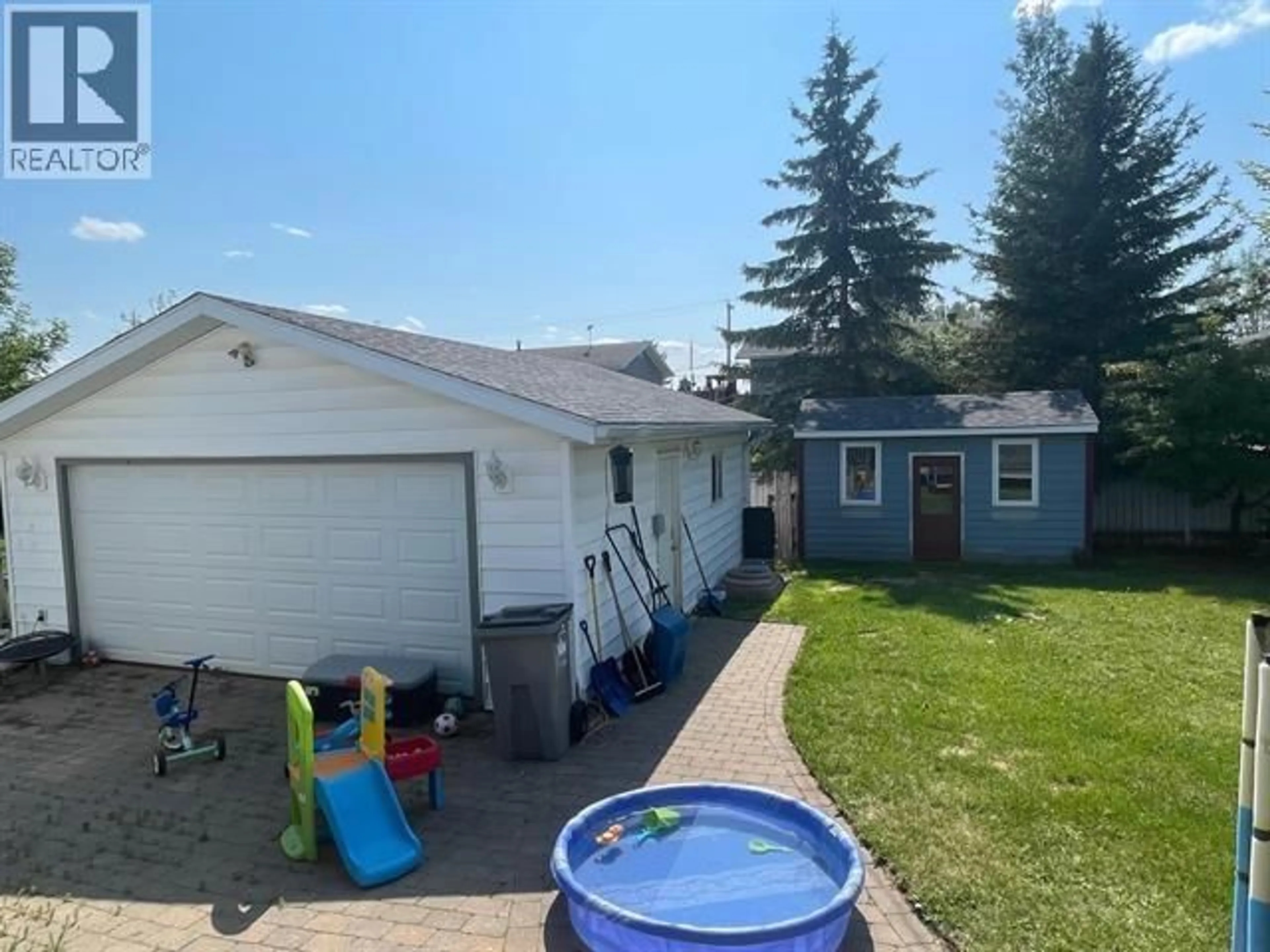 A pic from outside/outdoor area/front of a property/back of a property/a pic from drone, unknown for 4711 SPRUCE AVENUE, Fort Nelson British Columbia V0C1R0