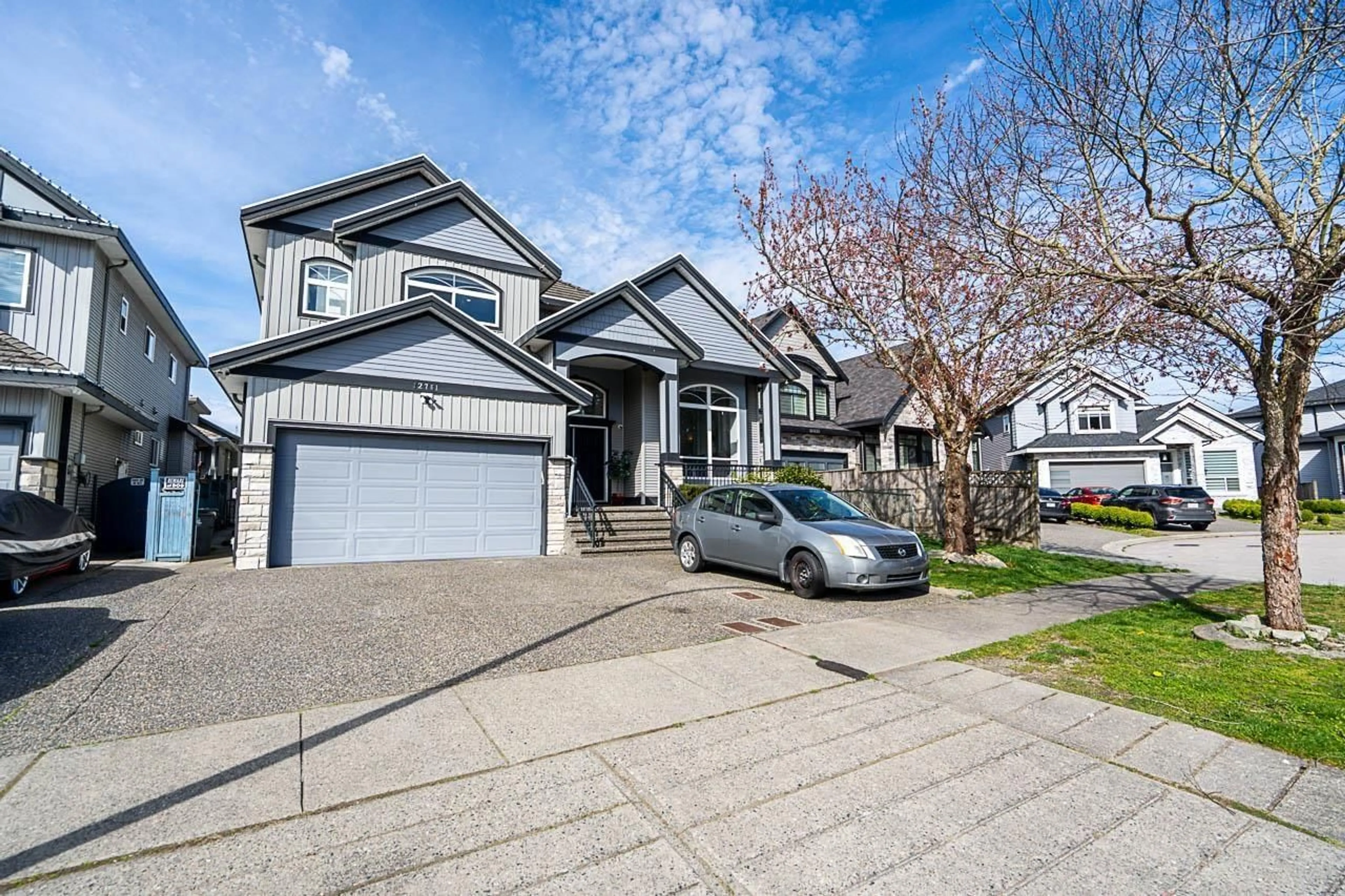 Home with vinyl exterior material, street for 12761 60A AVENUE, Surrey British Columbia V3X0A1