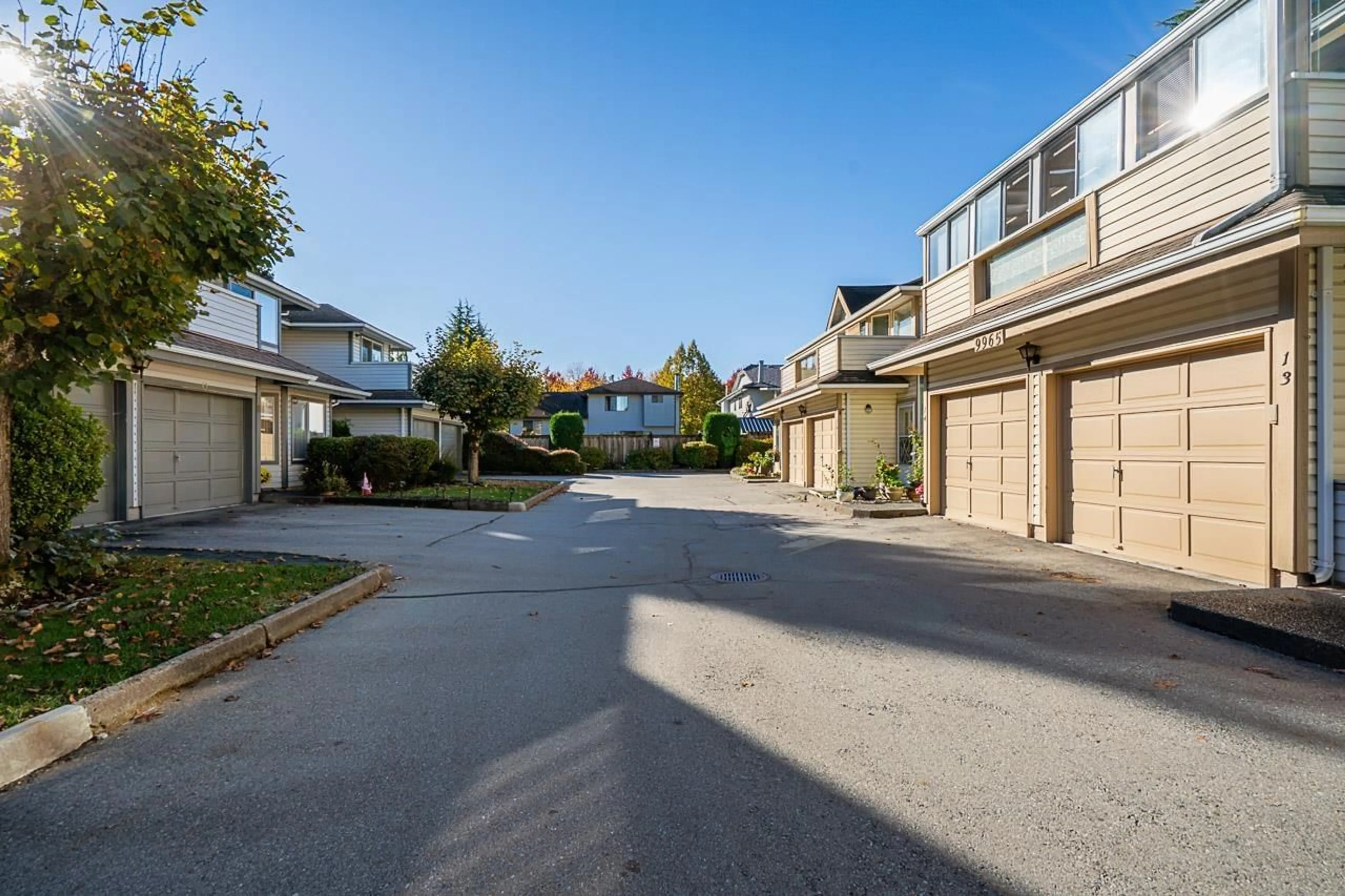 A pic from outside/outdoor area/front of a property/back of a property/a pic from drone, street for 9 - 9947 151 STREET, Surrey British Columbia V3R9A1