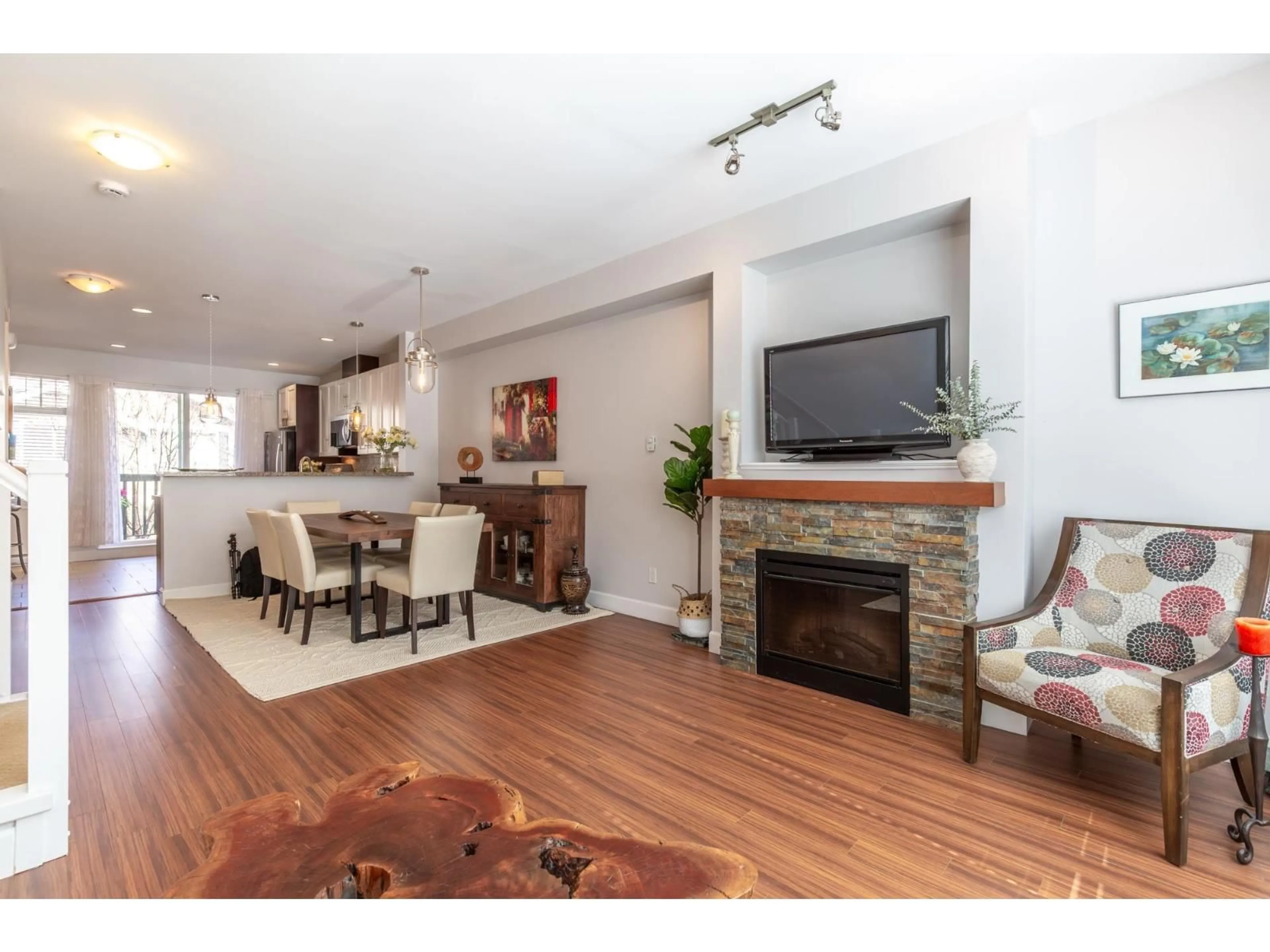 Living room with furniture, wood/laminate floor for 110 - 2979 156 STREET, Surrey British Columbia V3Z8V8