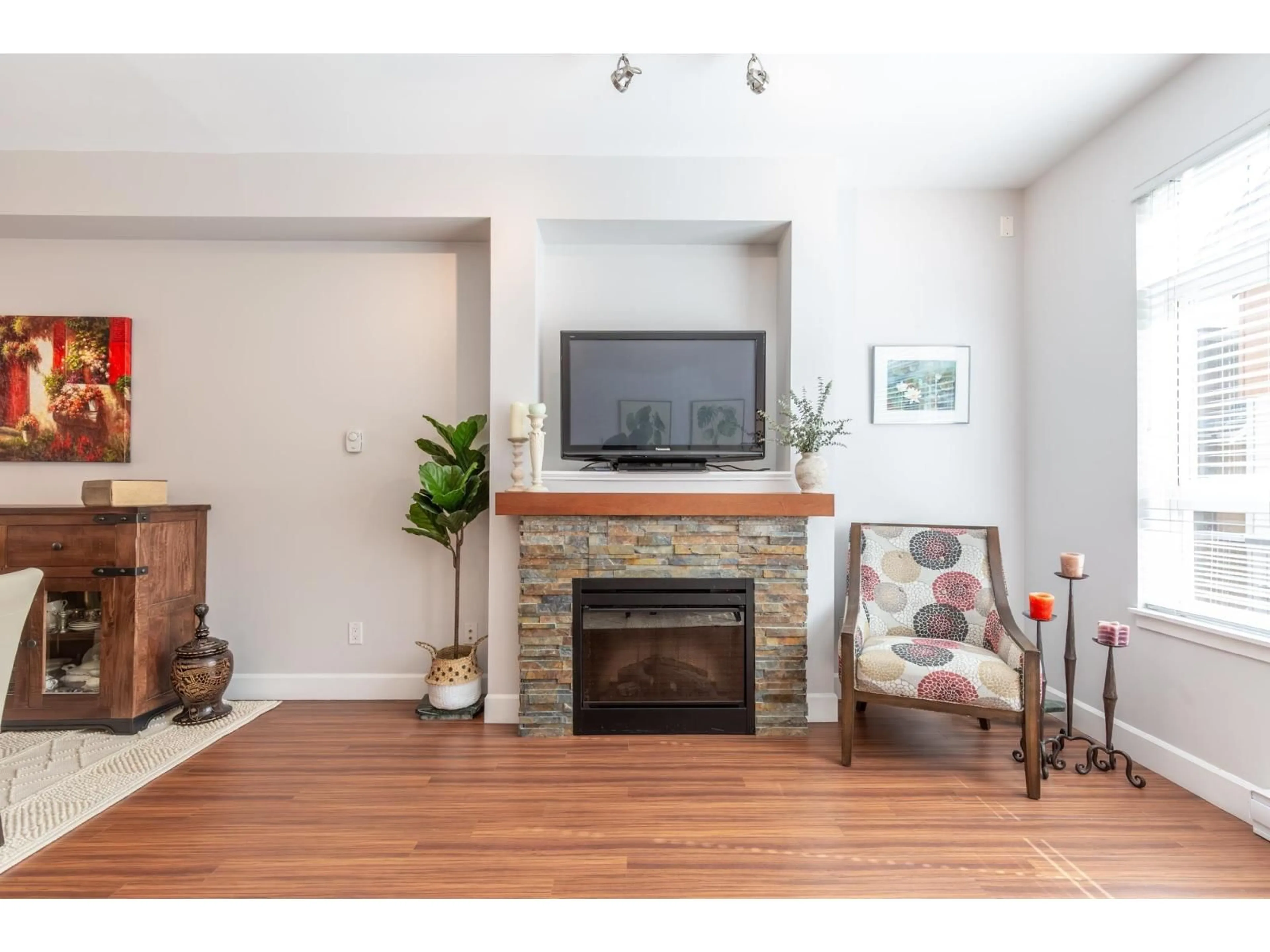 Living room with furniture, wood/laminate floor for 110 - 2979 156 STREET, Surrey British Columbia V3Z8V8