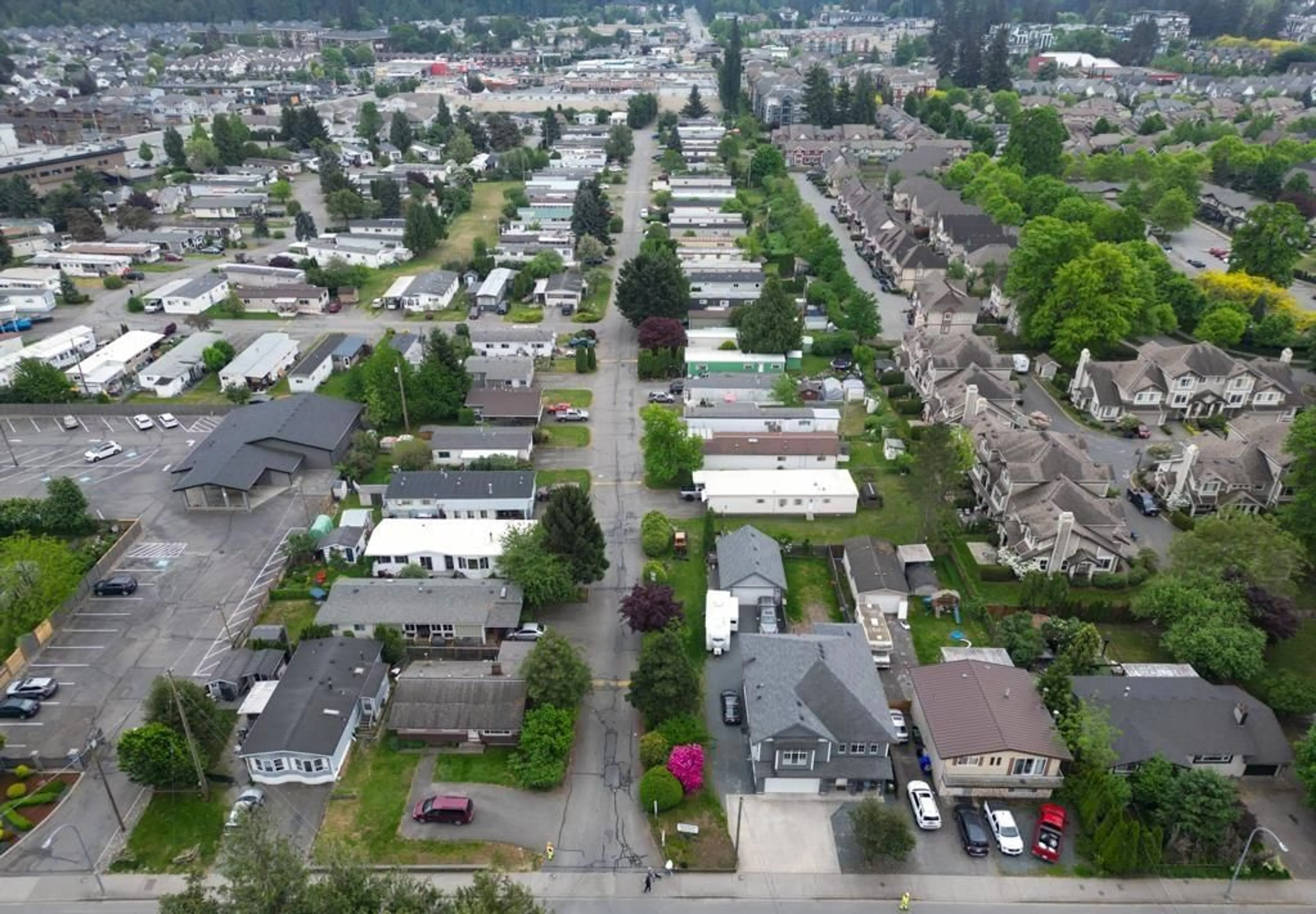A pic from outside/outdoor area/front of a property/back of a property/a pic from drone, street for 106 - 45640 WATSON ROAD, Chilliwack British Columbia V2R3P8