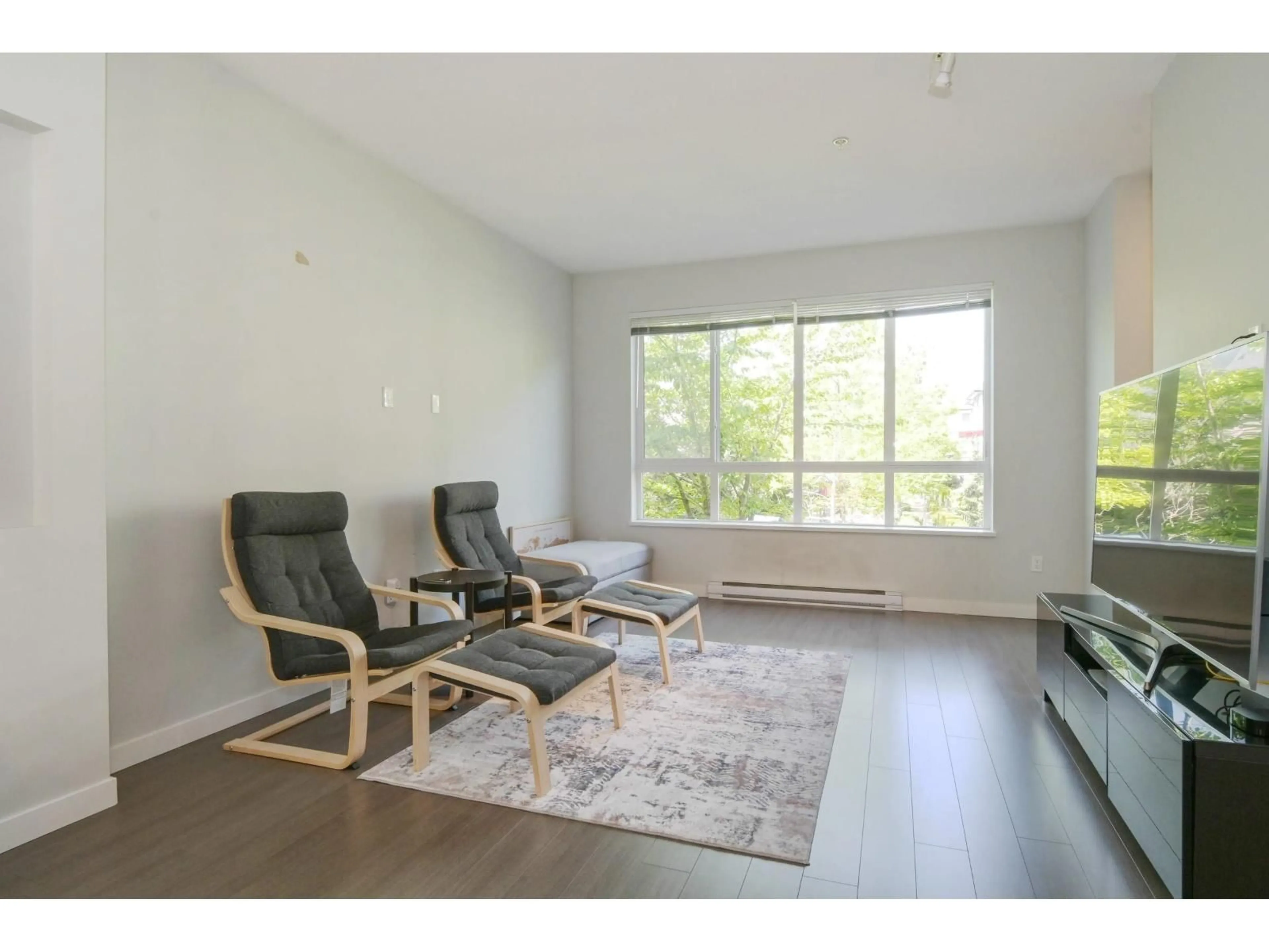Living room with furniture, wood/laminate floor for 44 - 8138 204 STREET, Langley British Columbia V2Y0T4