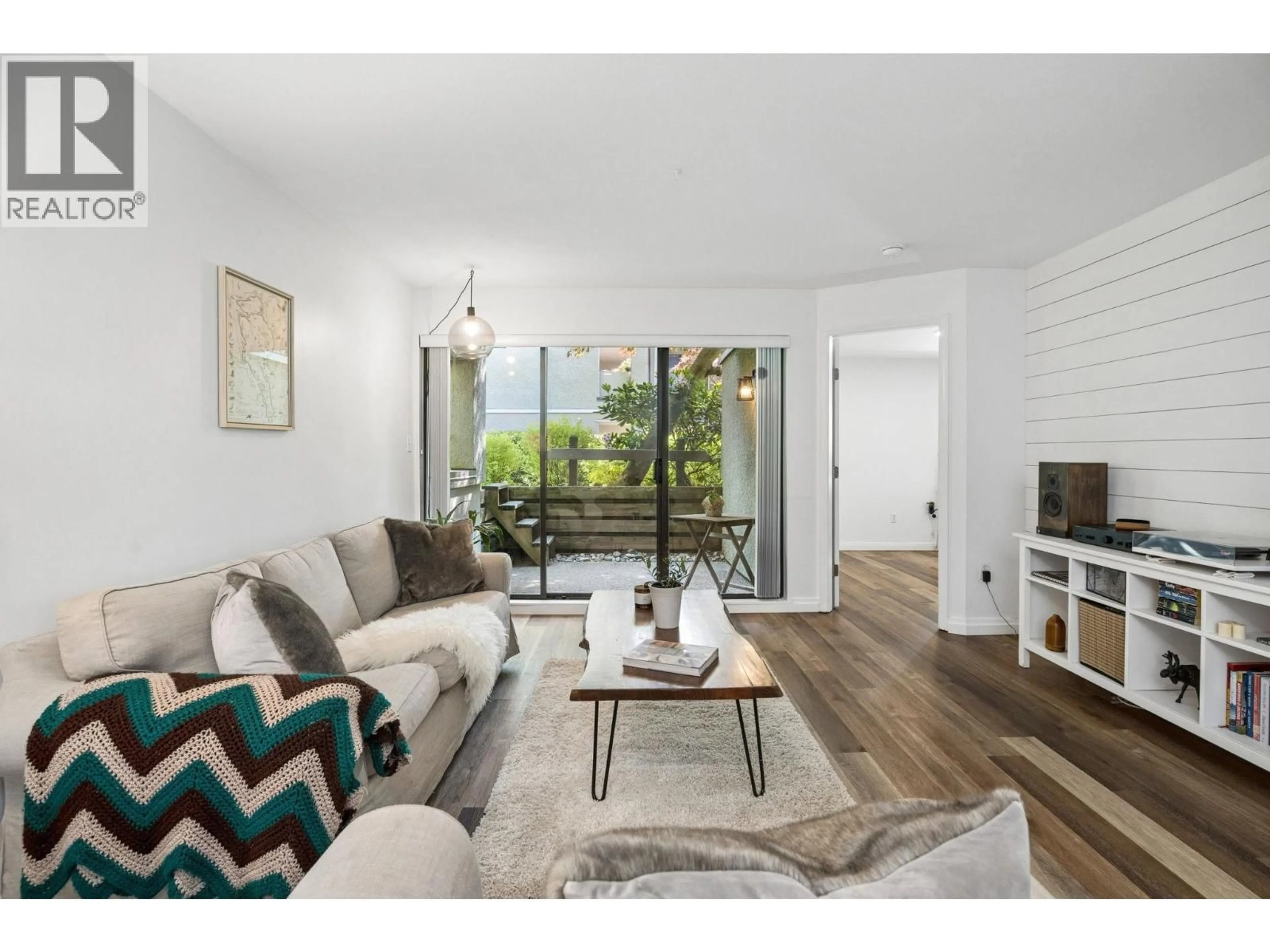 Living room with furniture, wood/laminate floor for 108 - 1200 PACIFIC STREET, Coquitlam British Columbia V3B6K2