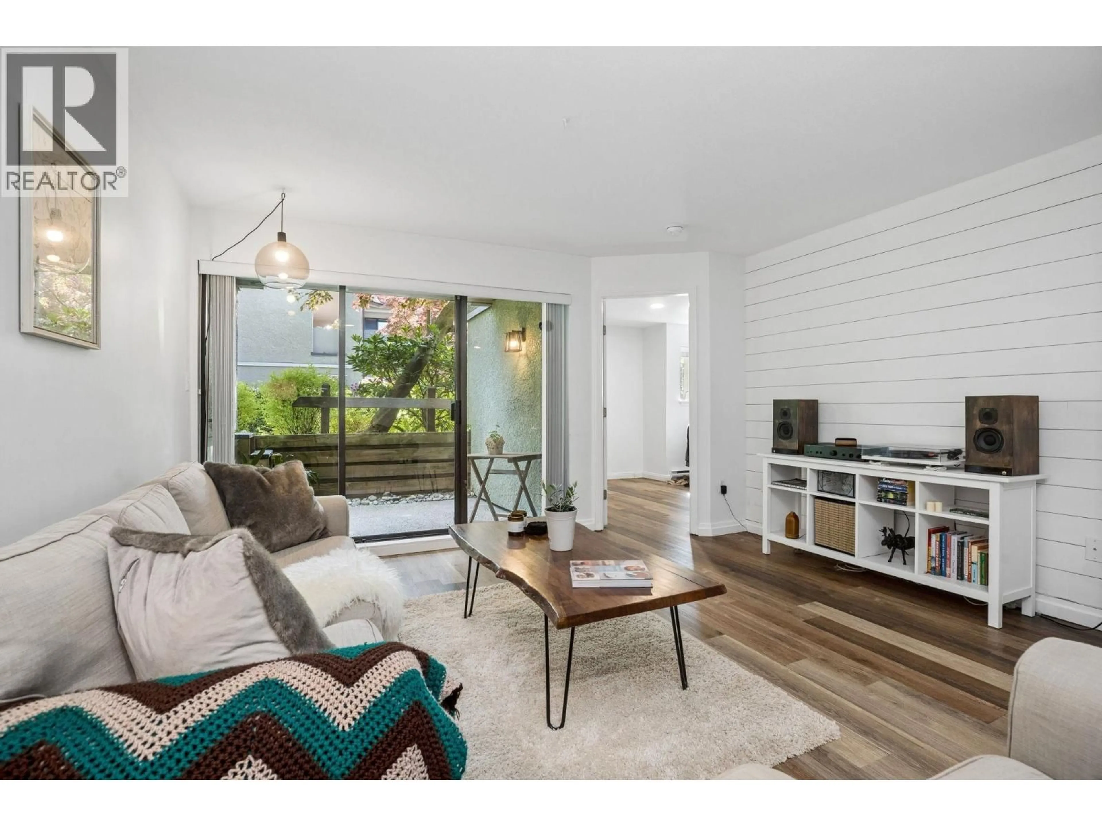 Living room with furniture, wood/laminate floor for 108 - 1200 PACIFIC STREET, Coquitlam British Columbia V3B6K2