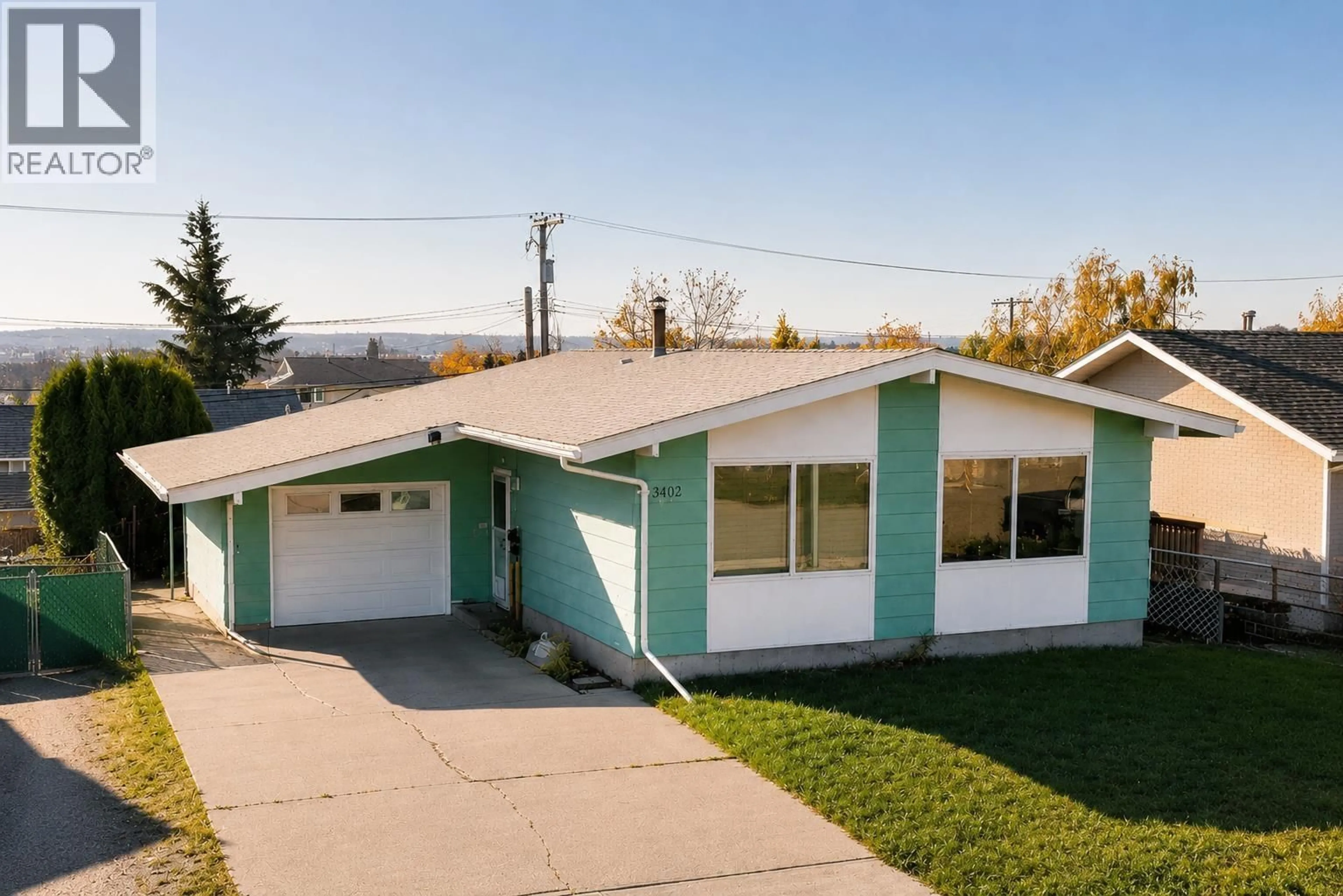 Home with vinyl exterior material, street for 10311 103 AVENUE, Fort St. John British Columbia V1J2H7