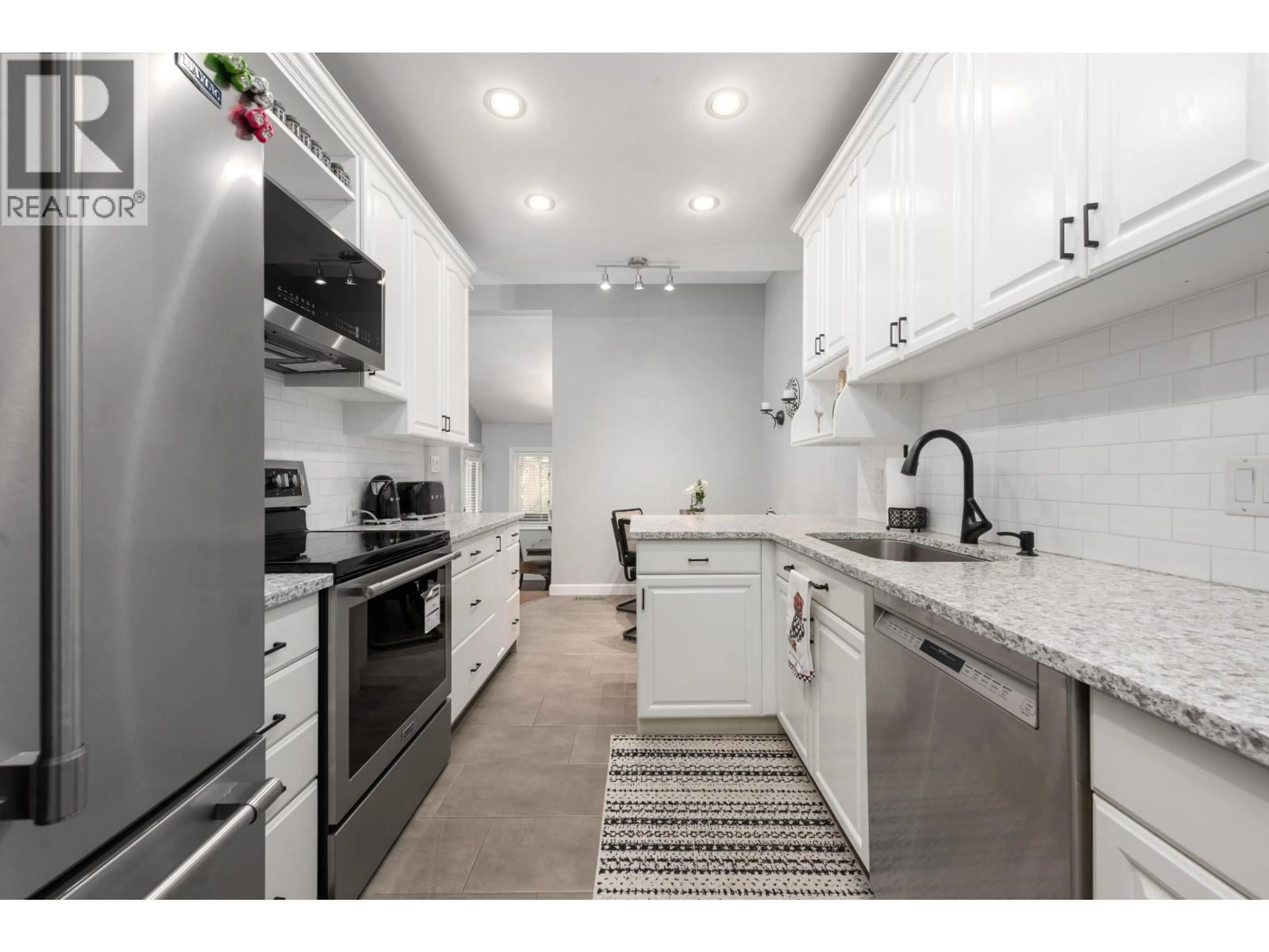 Open concept kitchen, ceramic/tile floor for 1991 CEDAR VILLAGE CRESCENT, North Vancouver British Columbia V7J3P5
