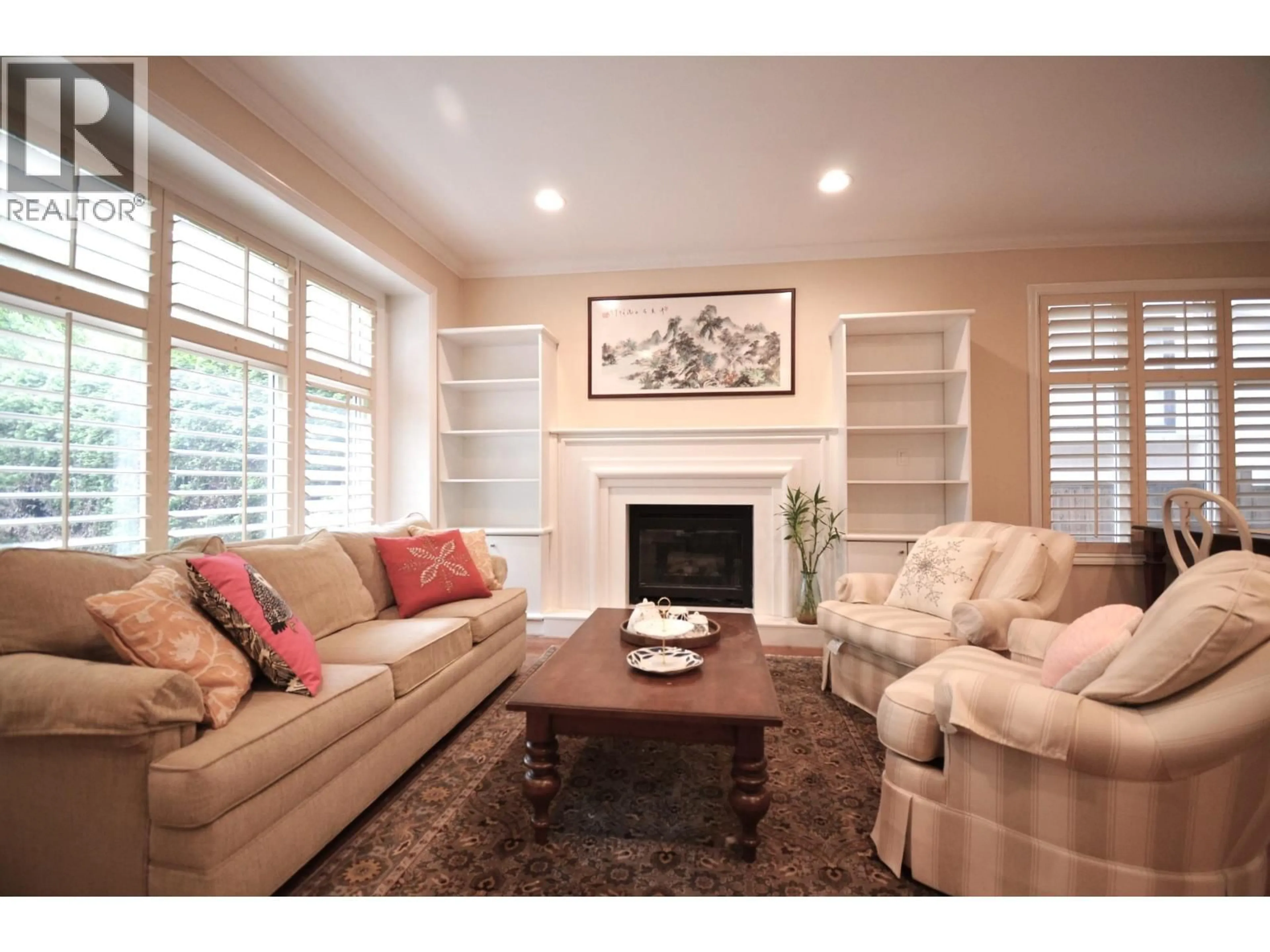 Living room with furniture, wood/laminate floor for 4347 13TH AVENUE, Vancouver British Columbia V6R2V1
