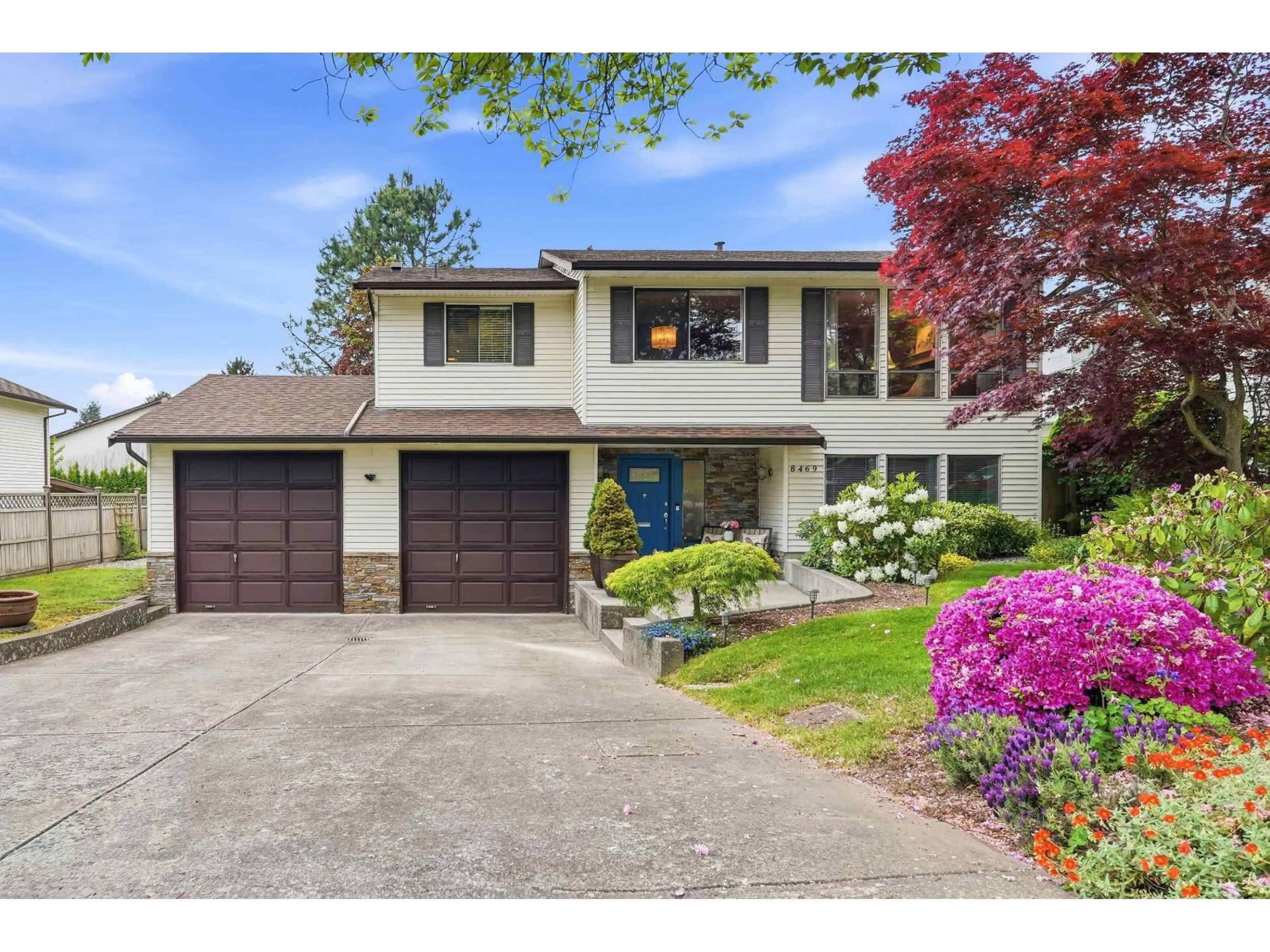Home with vinyl exterior material, street for 8469 153A STREET, Surrey British Columbia V3S6J2