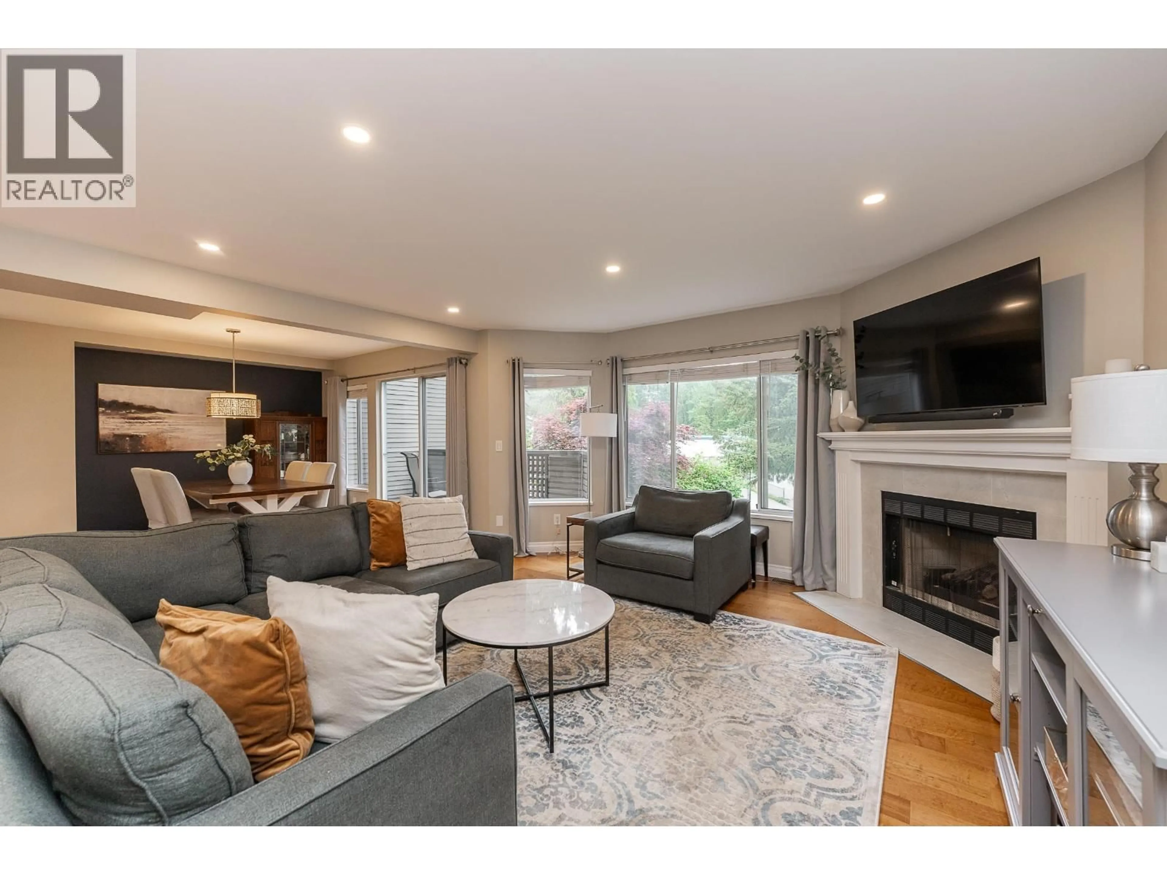 Living room with furniture, wood/laminate floor for 42 - 1271 LASALLE PLACE, Coquitlam British Columbia V3B7C8