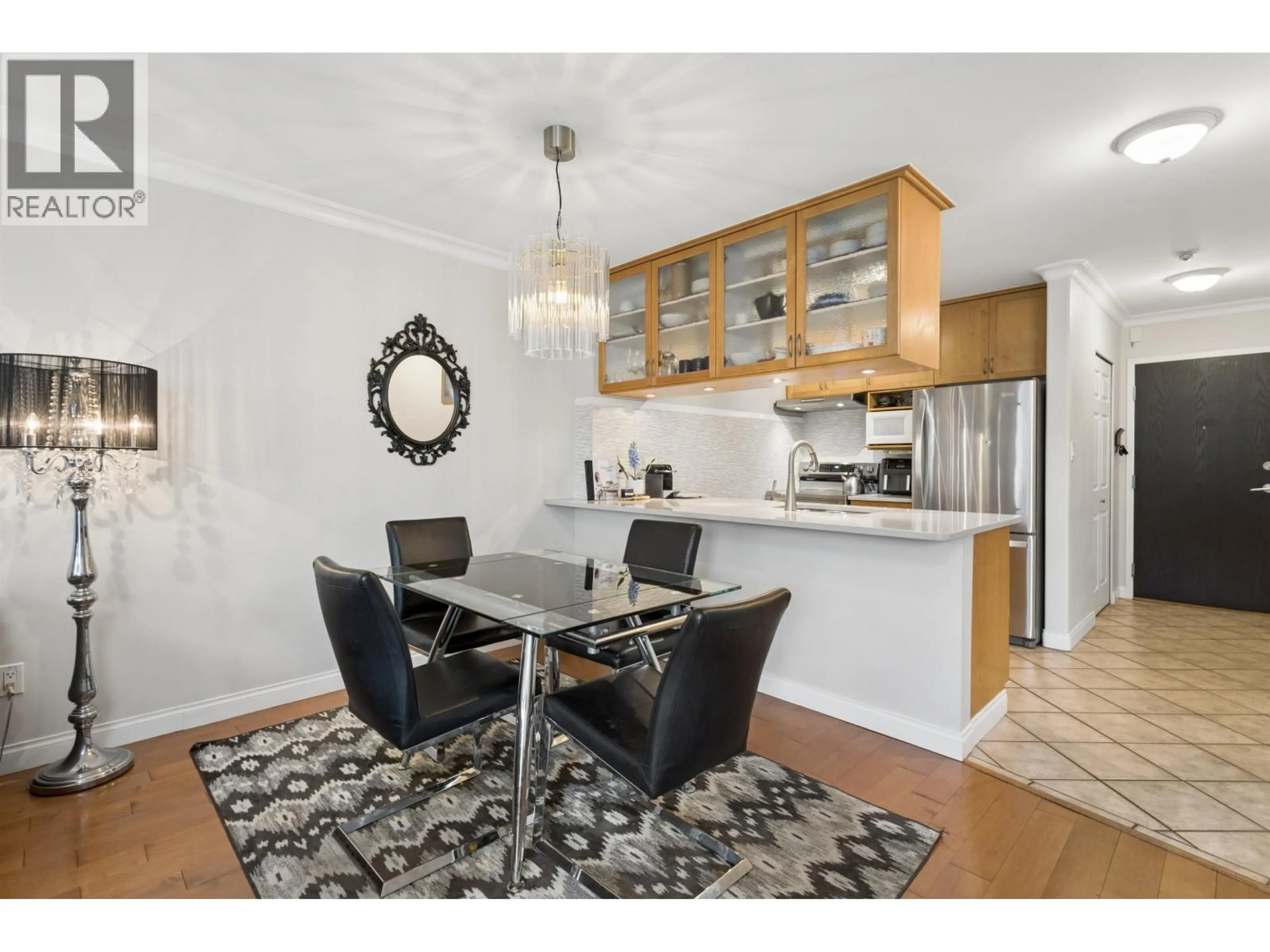 Open concept kitchen, wood/laminate floor for 303 - 1508 MARINER WALK, Vancouver British Columbia V6J4X9