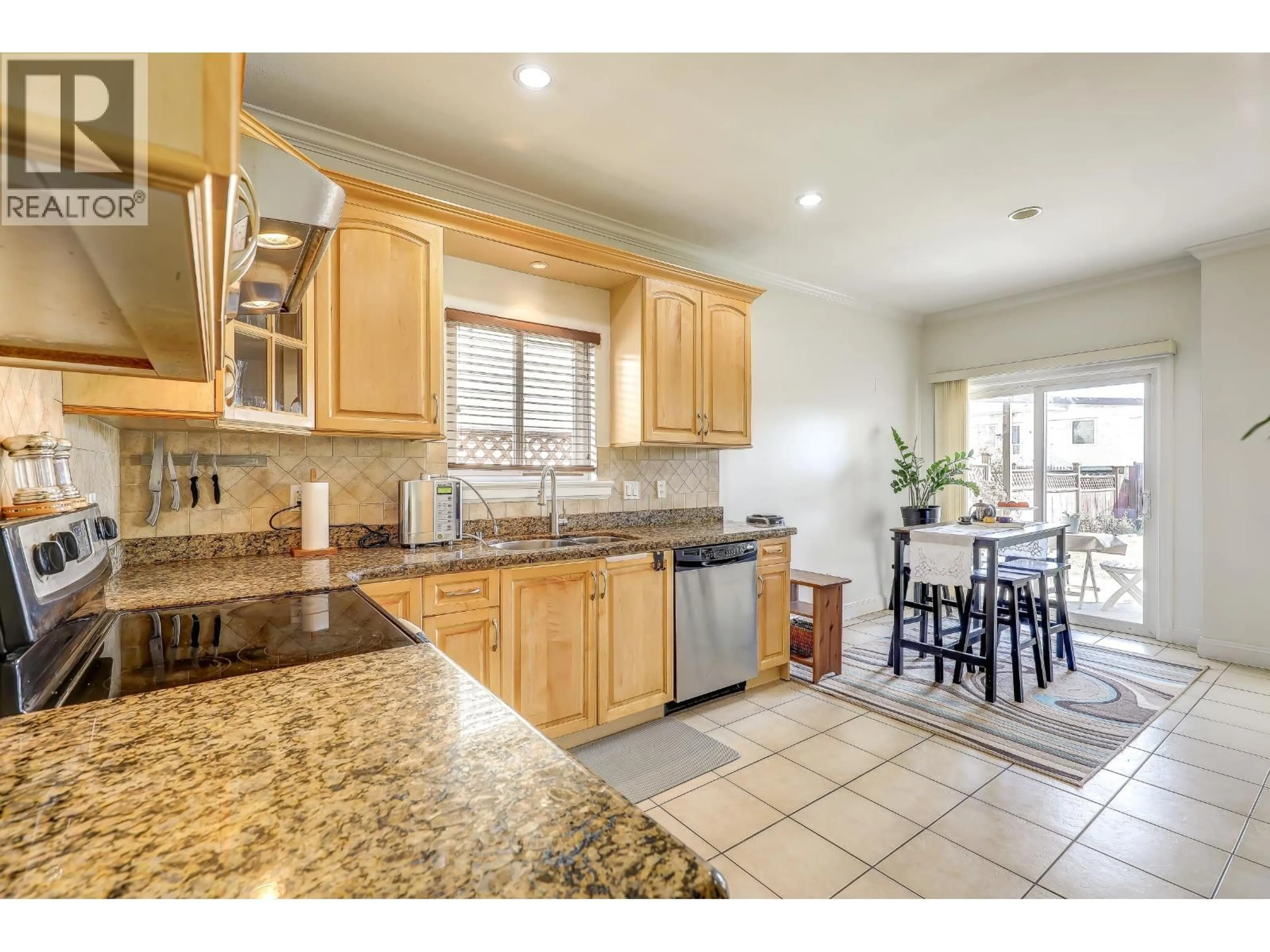 Open concept kitchen, ceramic/tile floor for 7448 17TH AVE AVENUE, Burnaby British Columbia V3N1L4
