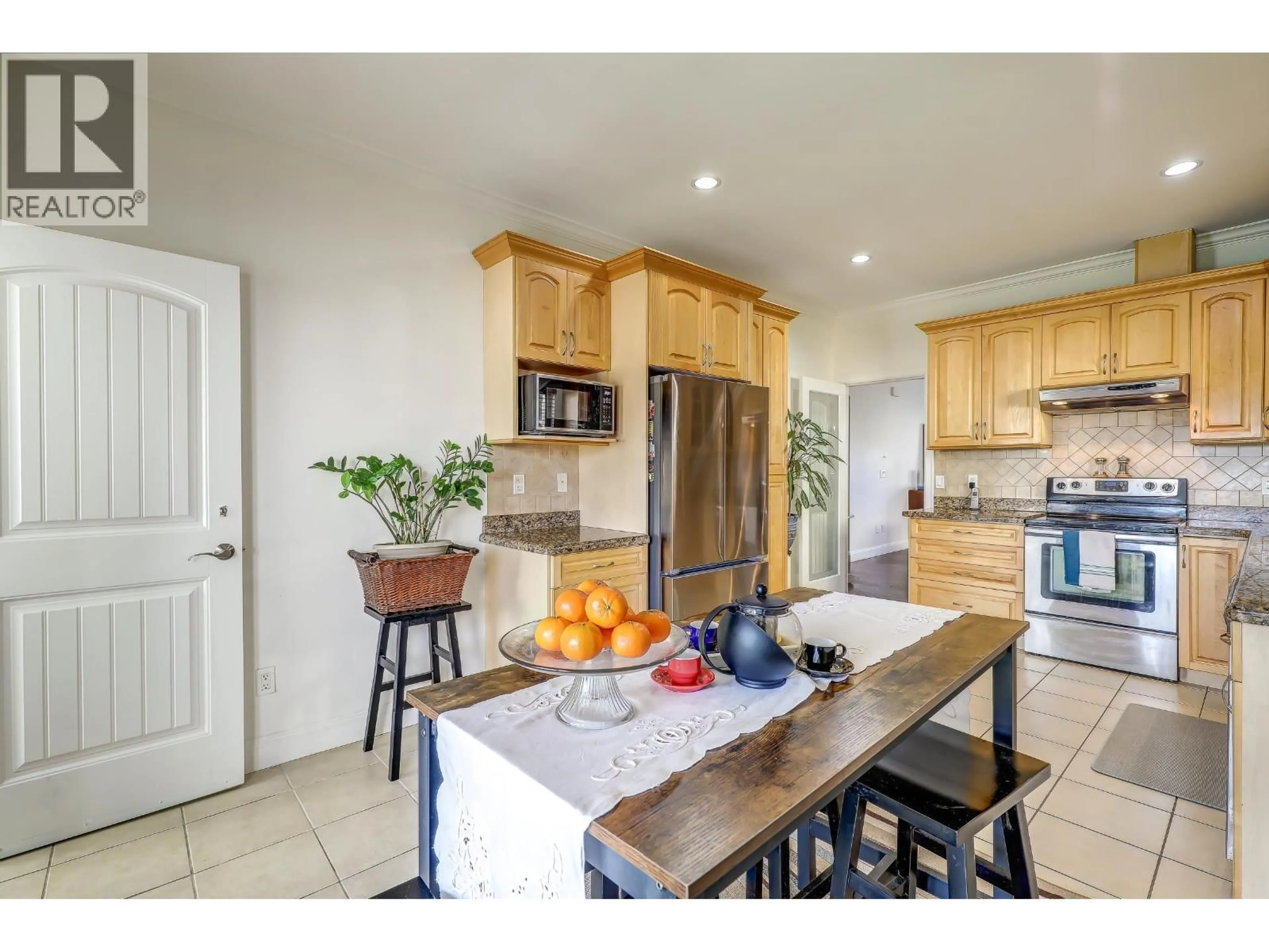 Open concept kitchen, ceramic/tile floor for 7448 17TH AVE AVENUE, Burnaby British Columbia V3N1L4