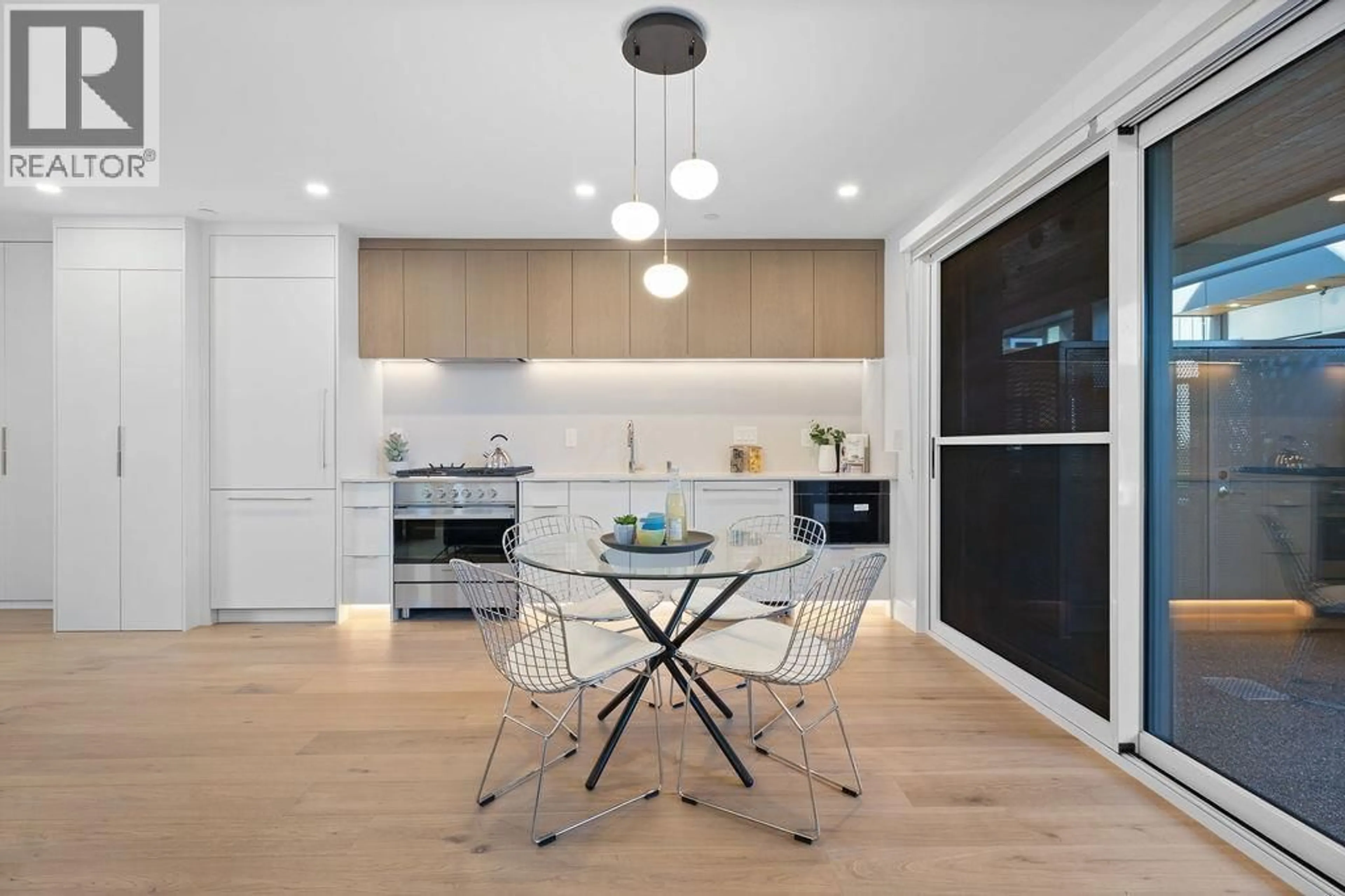 Contemporary kitchen, wood/laminate floor for 1137 33RD AVENUE, Vancouver British Columbia V6M1A3