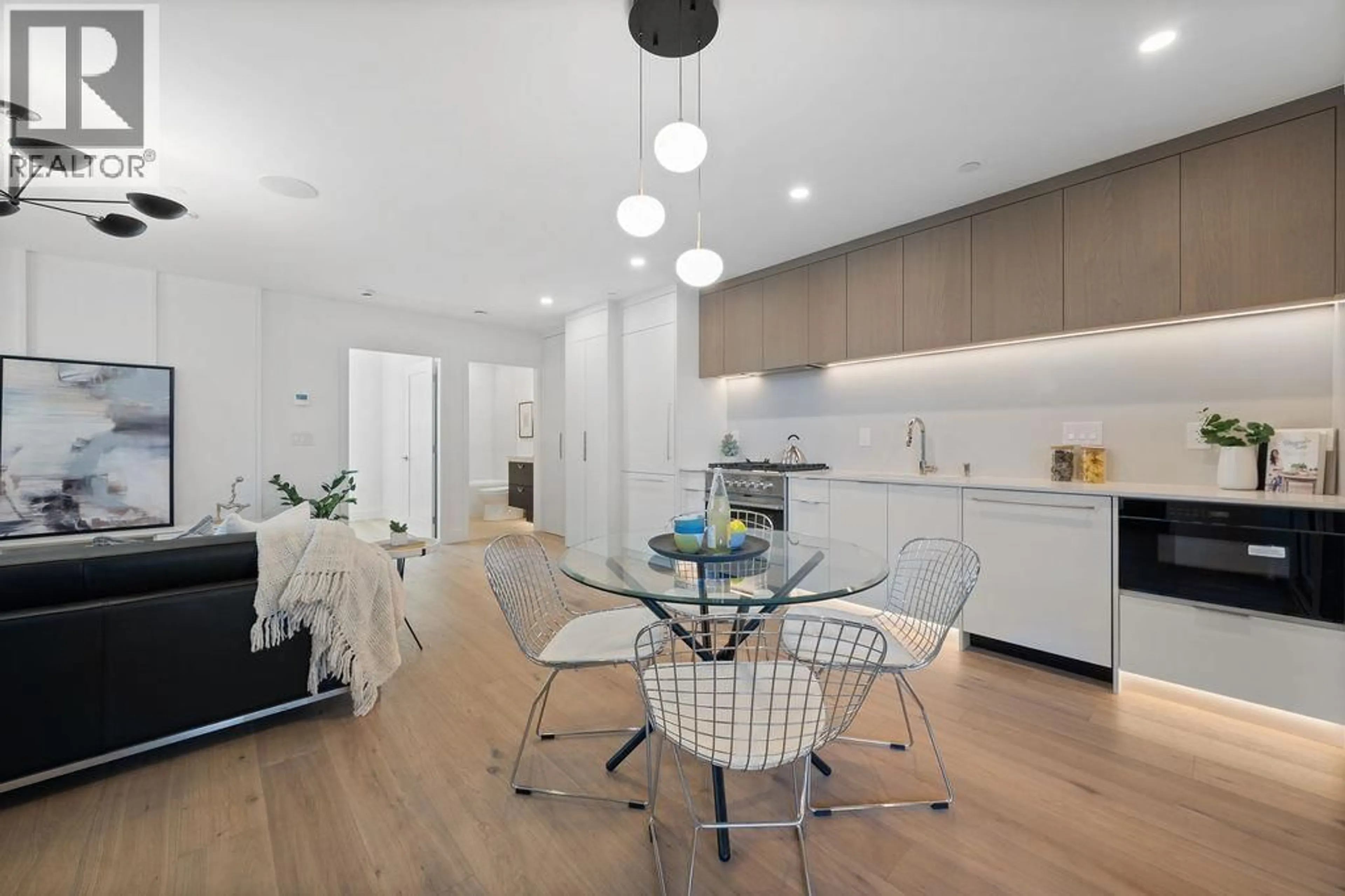 Contemporary kitchen, wood/laminate floor for 1137 33RD AVENUE, Vancouver British Columbia V6M1A3