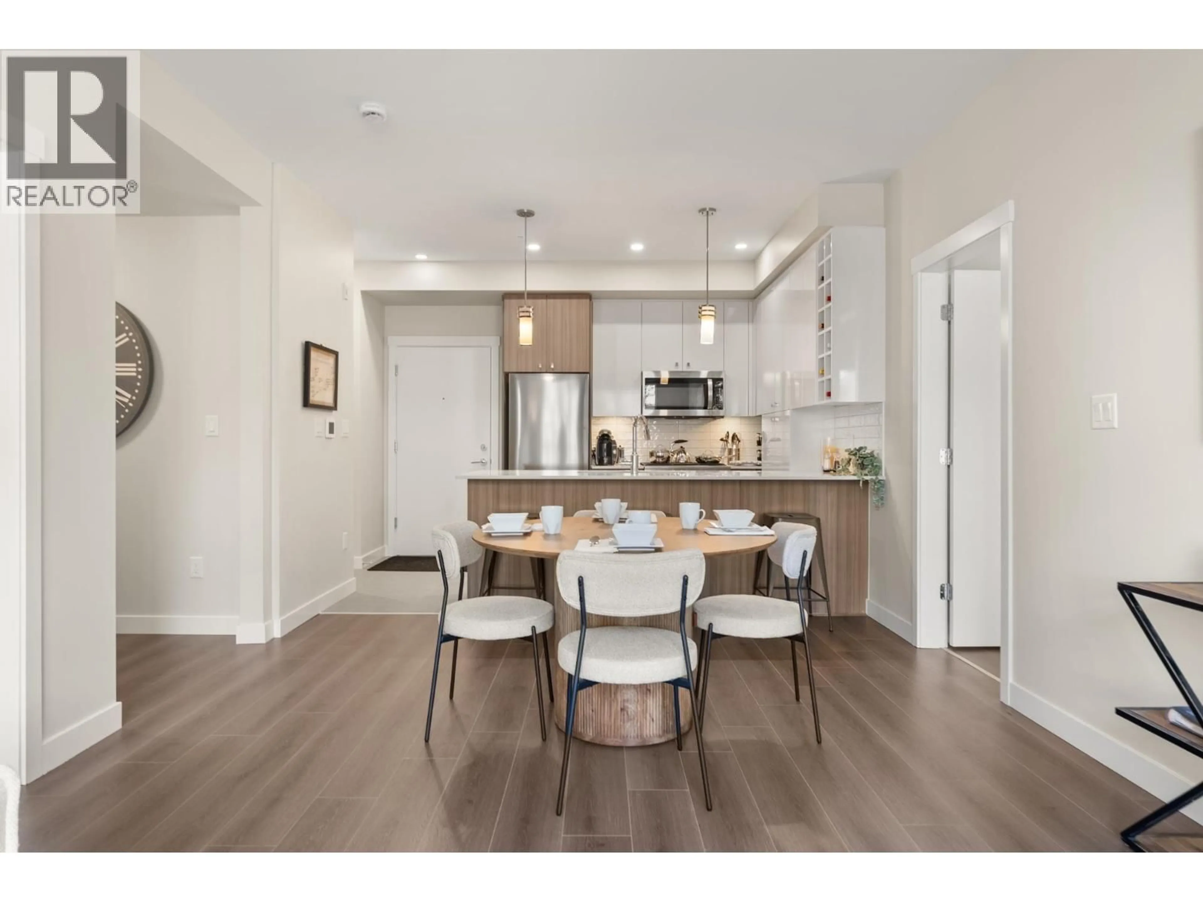 Open concept kitchen, wood/laminate floor for 512 - 23222 GILLEY ROAD, Richmond British Columbia V6V0C8
