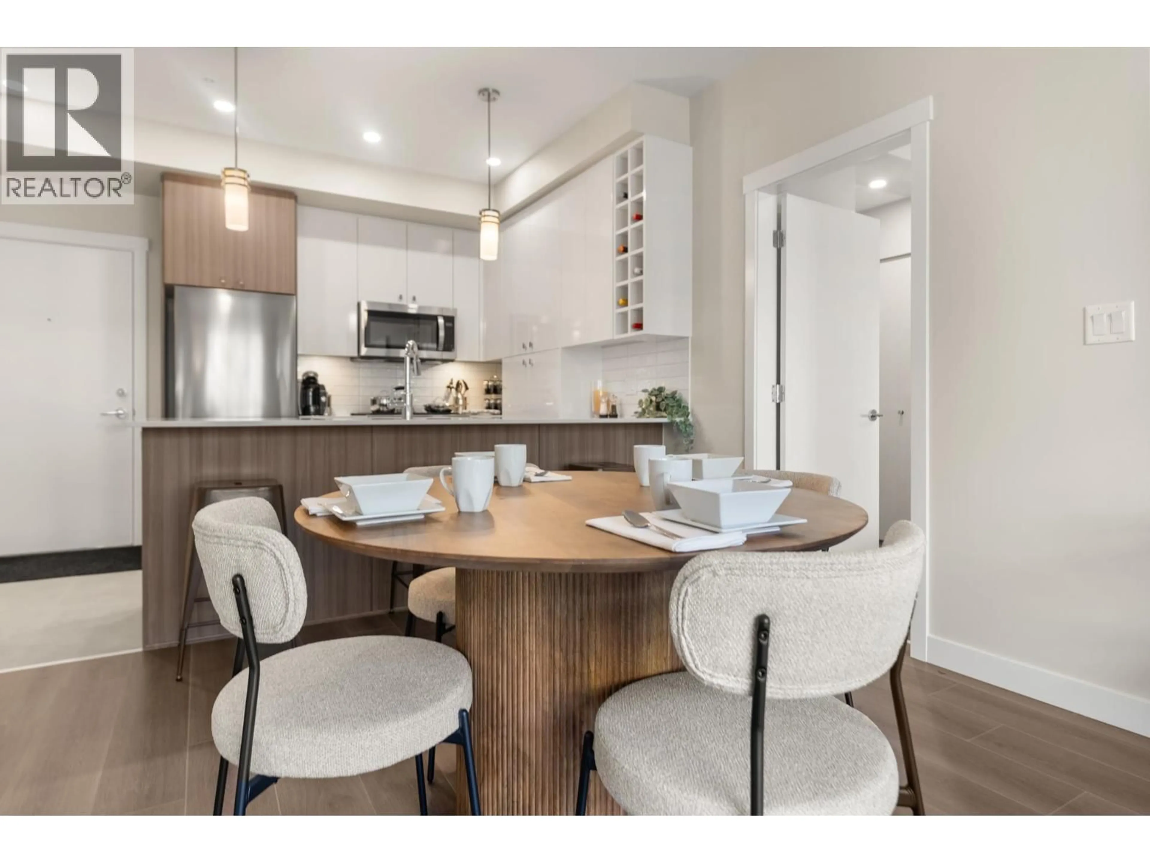 Open concept kitchen, wood/laminate floor for 512 - 23222 GILLEY ROAD, Richmond British Columbia V6V0C8