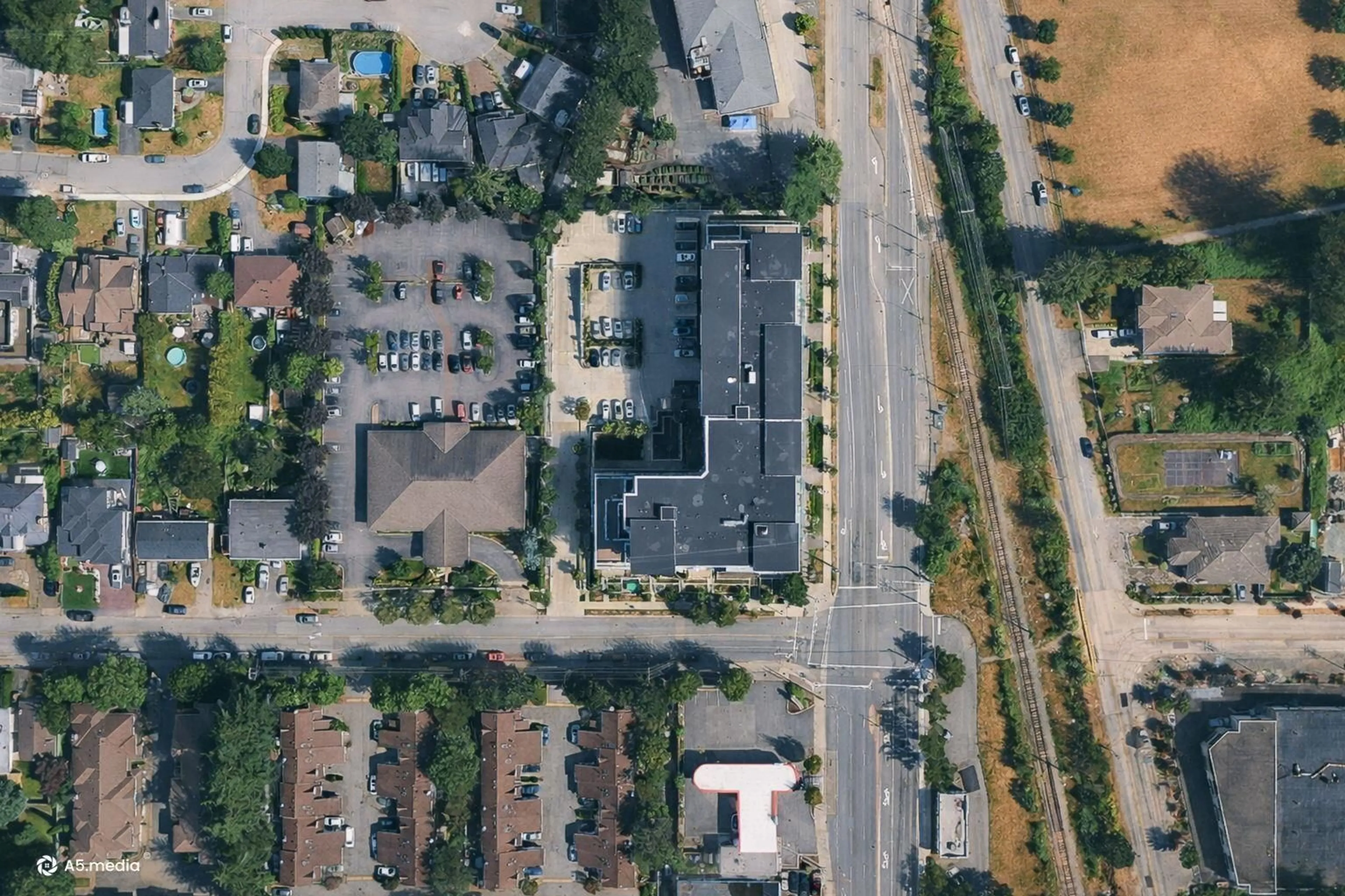 A pic from outside/outdoor area/front of a property/back of a property/a pic from drone, street for 309 - 9015 120 STREET, Delta British Columbia V4C6R7