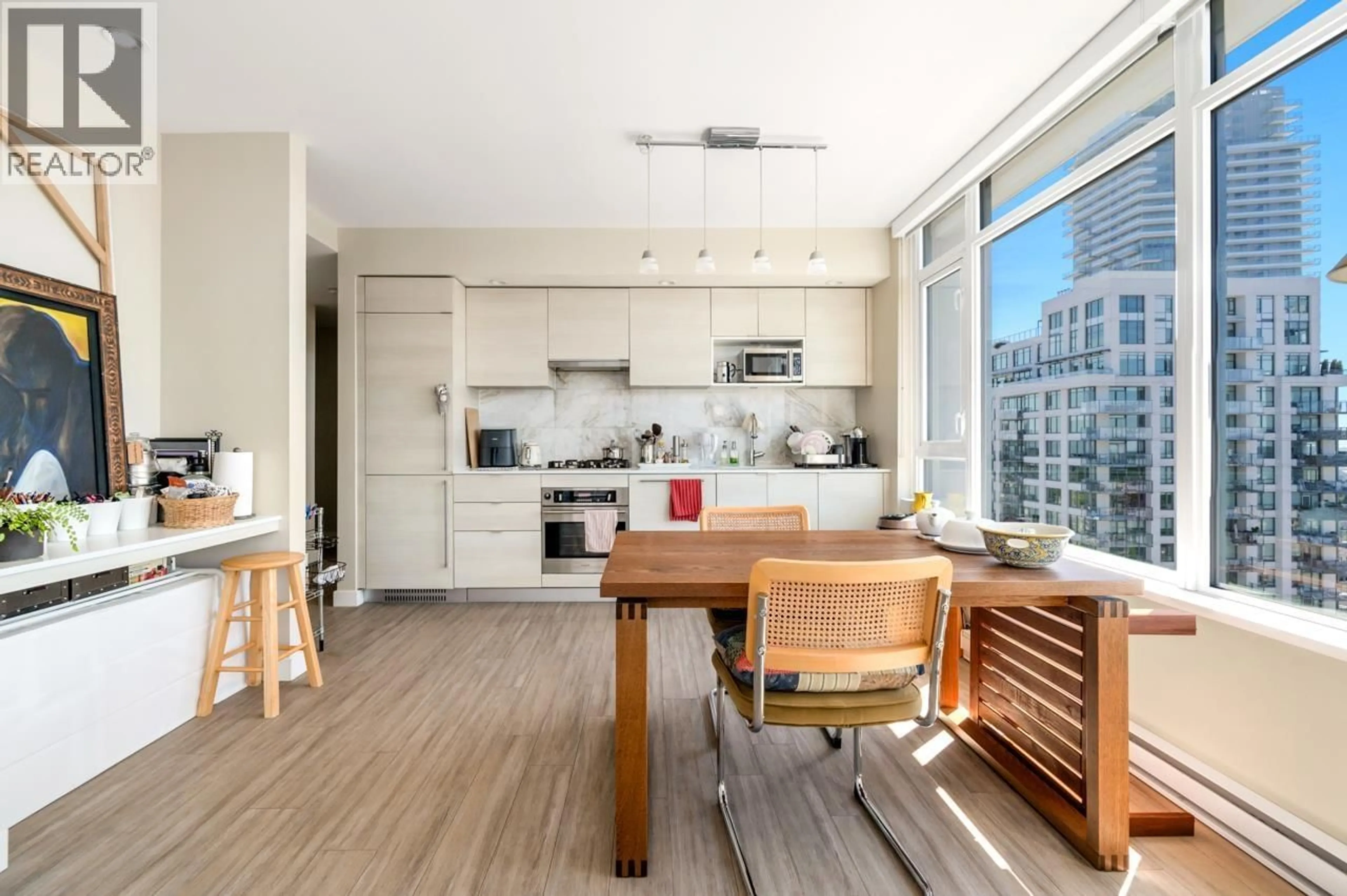 Open concept kitchen, wood/laminate floor for 2607 - 602 COMO LAKE AVENUE, Coquitlam British Columbia V3J0G2