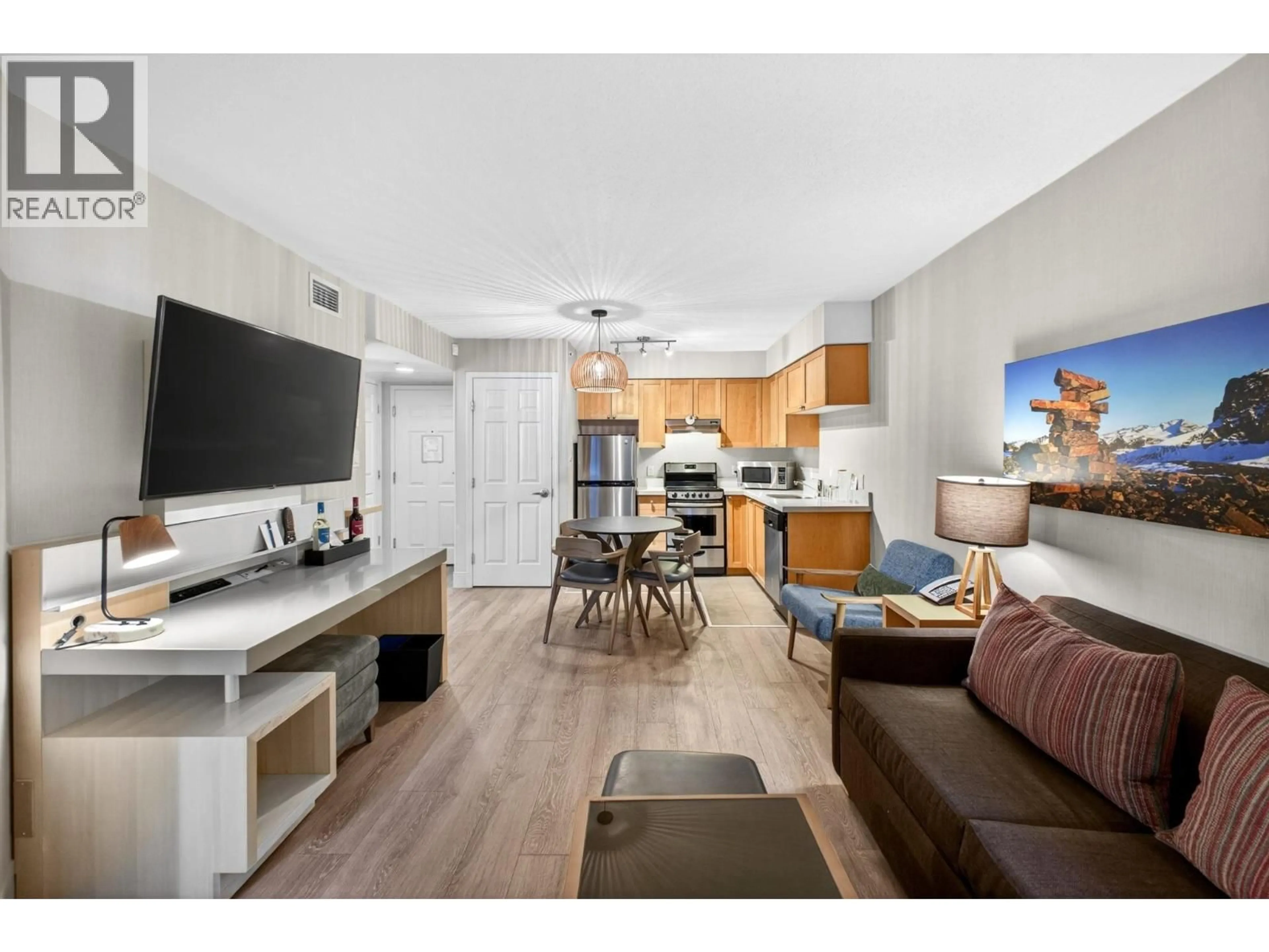 Living room with furniture, wood/laminate floor for 1211 - 4308 MAIN STREET, Whistler British Columbia V8E1A9
