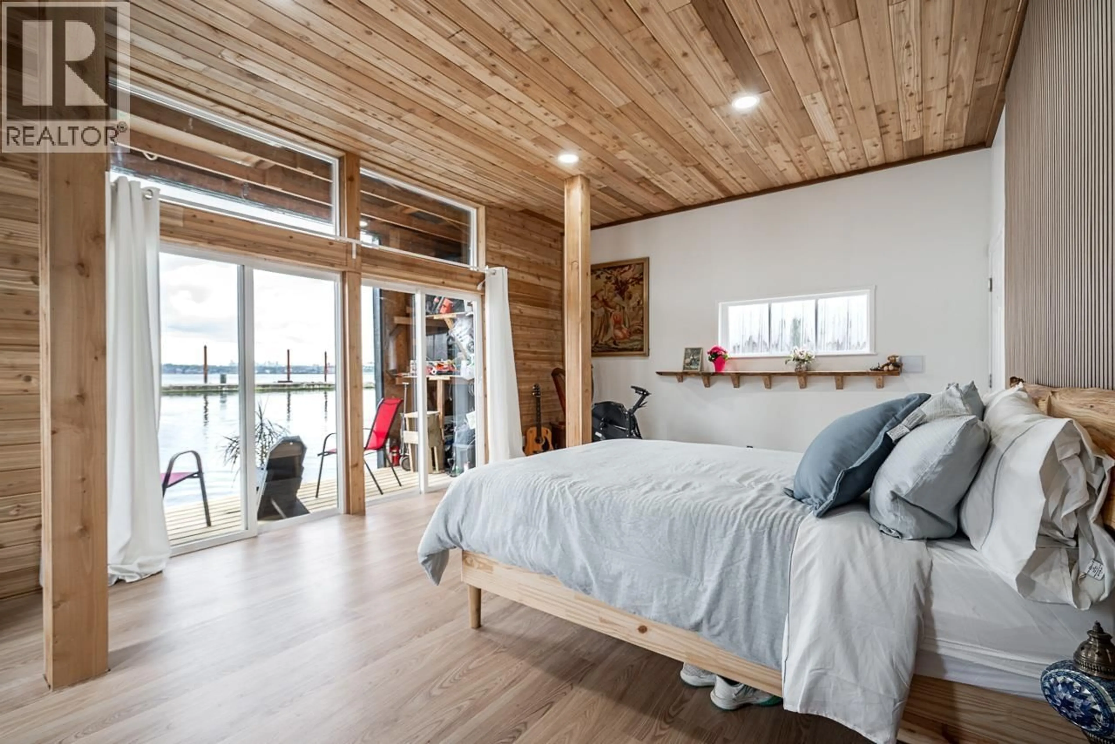 Bedroom with bed, wood/laminate floor for A24 - 415 ESPLANADE, North Vancouver British Columbia V7M1A6