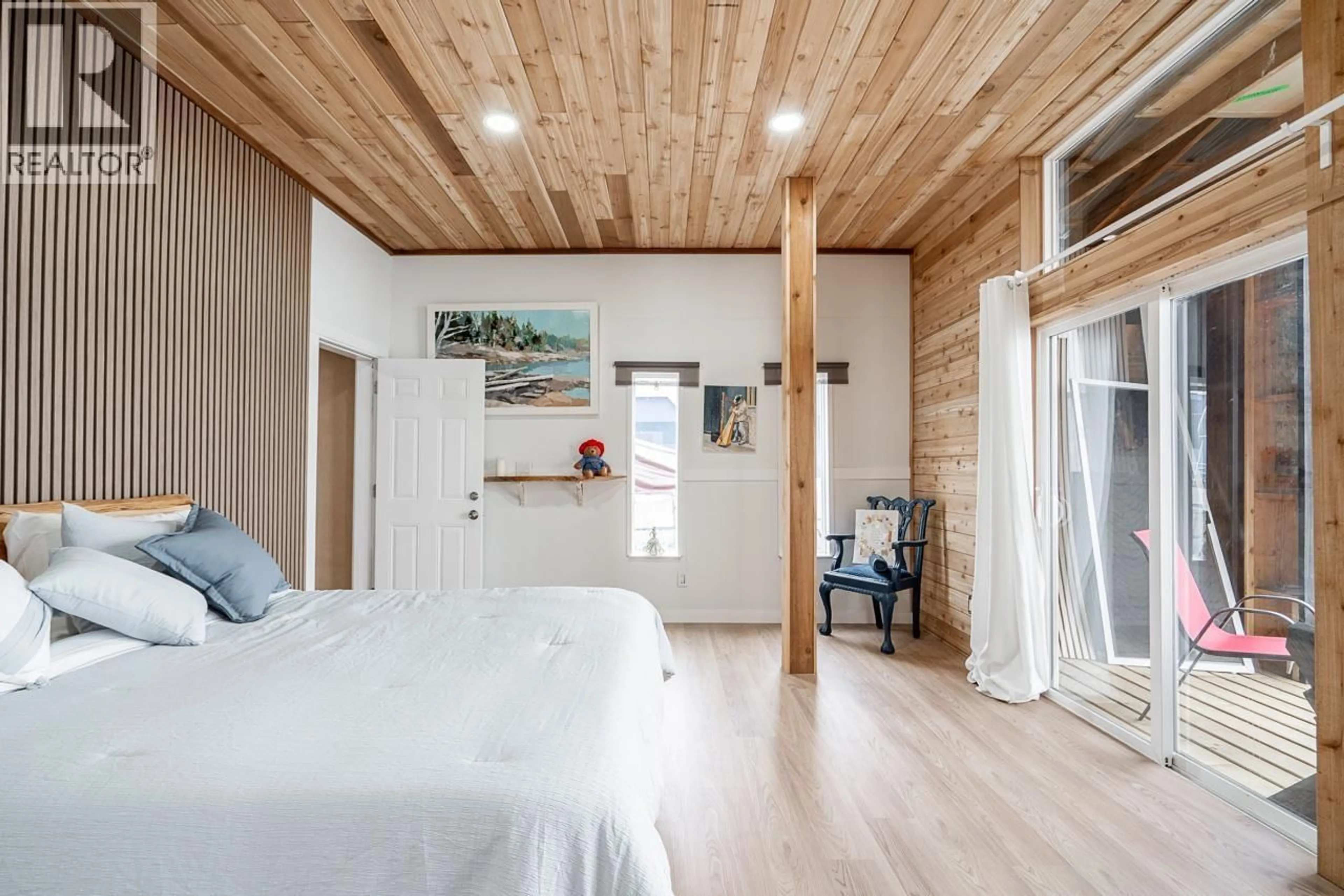 Bedroom with bed, wood/laminate floor for A24 - 415 ESPLANADE, North Vancouver British Columbia V7M1A6