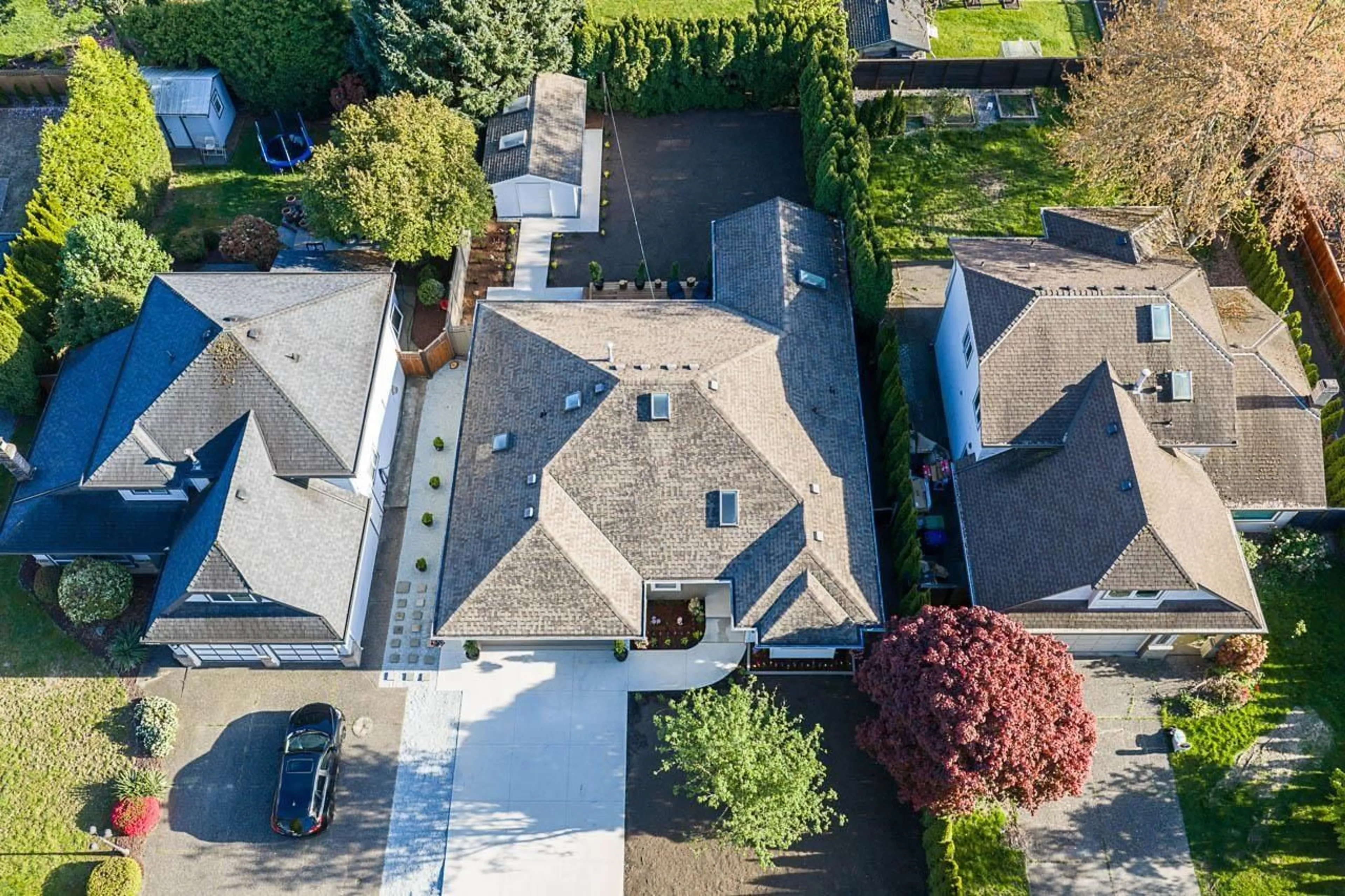 A pic from outside/outdoor area/front of a property/back of a property/a pic from drone, street for 15512 112 AVENUE, Surrey British Columbia V3R6H1