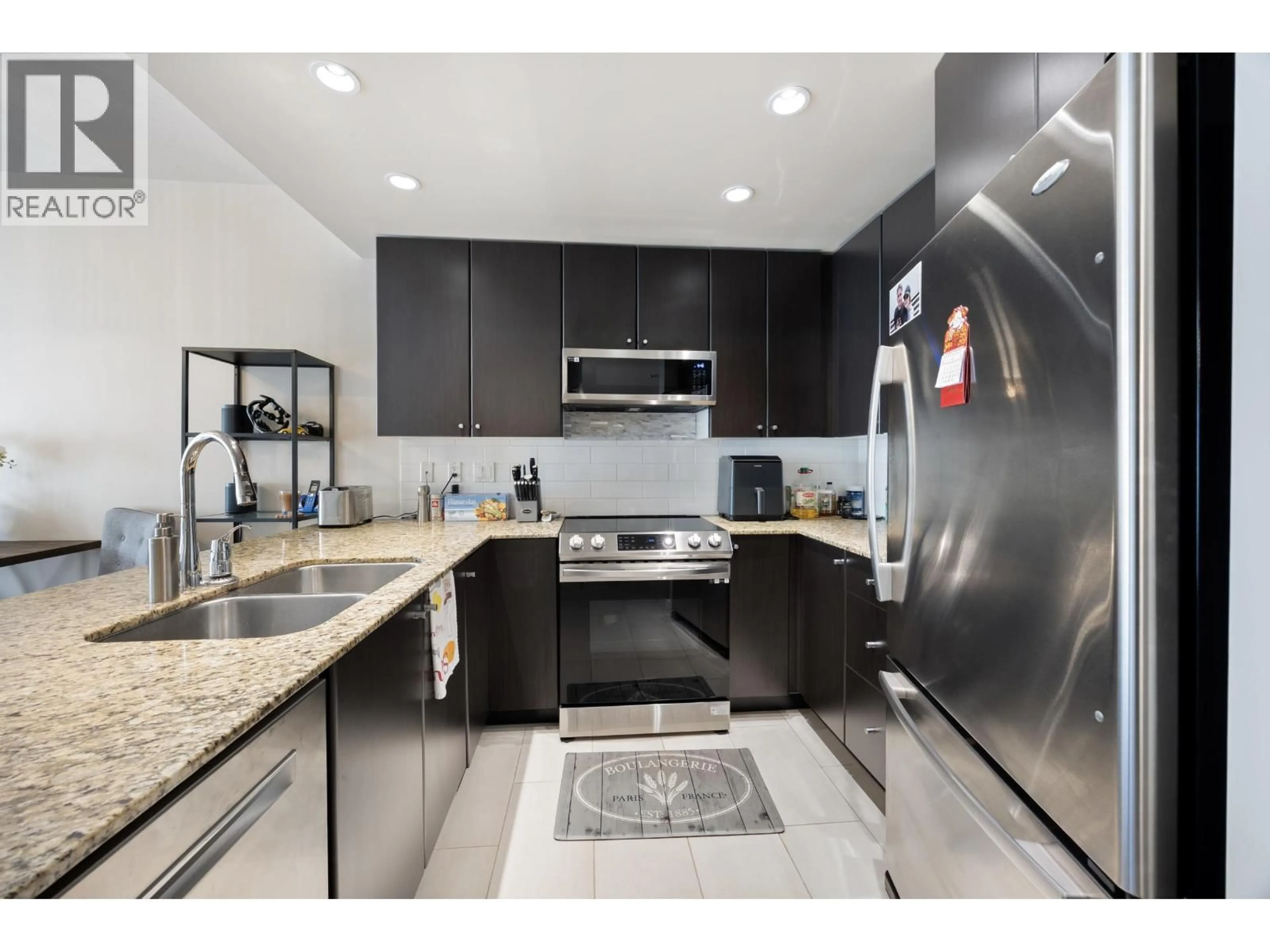 Open concept kitchen, ceramic/tile floor for 304 - 225 FRANCIS WAY, New Westminster British Columbia V3L0G1