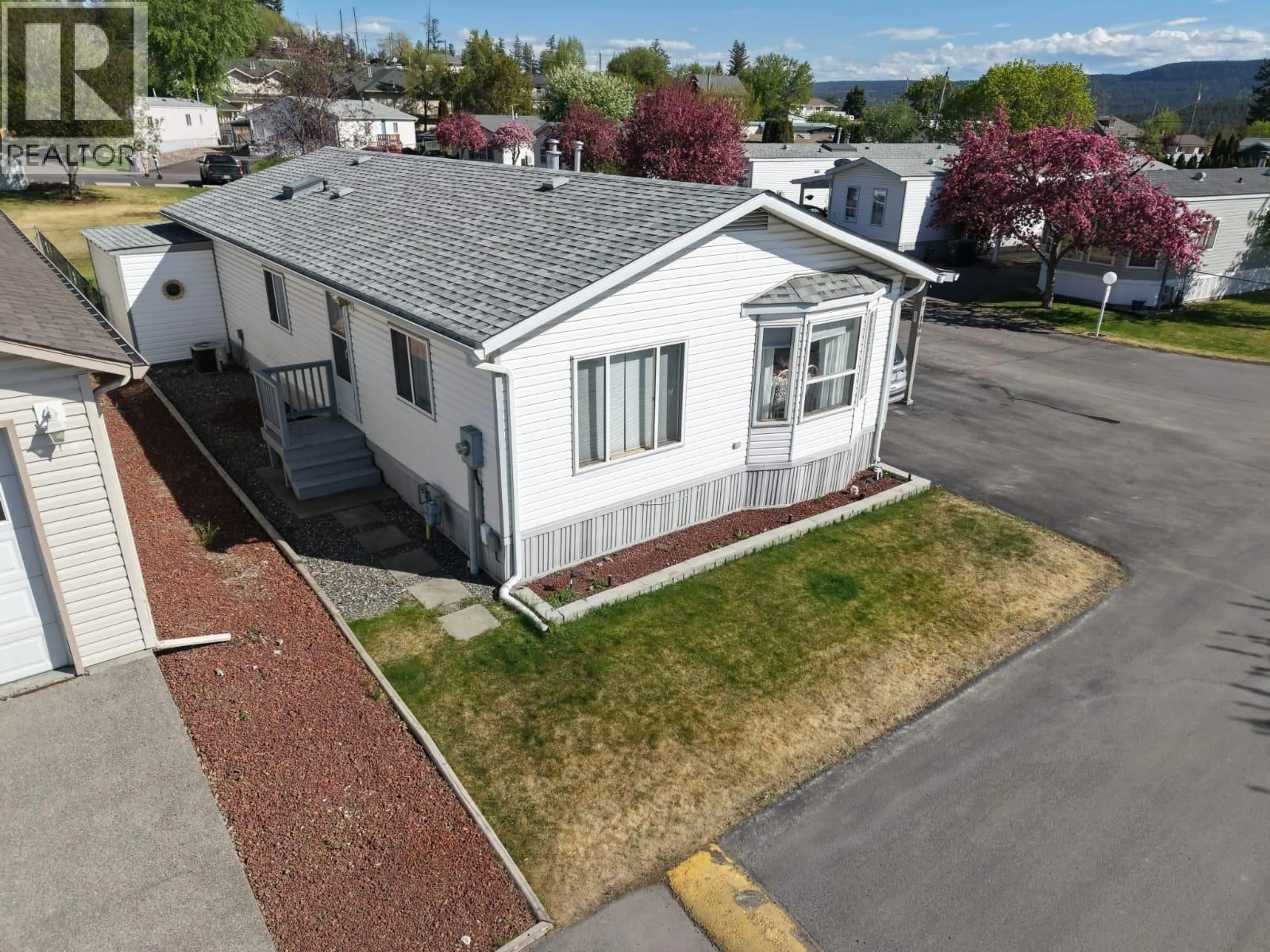 A pic from outside/outdoor area/front of a property/back of a property/a pic from drone, street for 106 BRAHMA CRESCENT, Williams Lake British Columbia V2G4T7