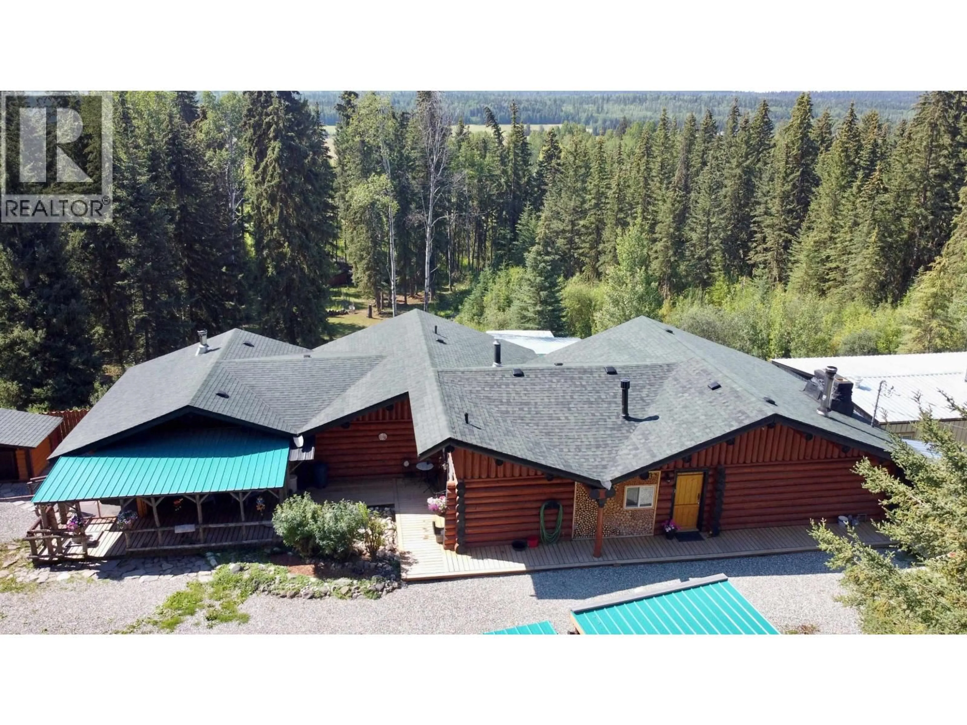 A pic from outside/outdoor area/front of a property/back of a property/a pic from drone, mountain view for 6006 VALLEYVIEW DRIVE, 100 Mile House British Columbia V0K2E3